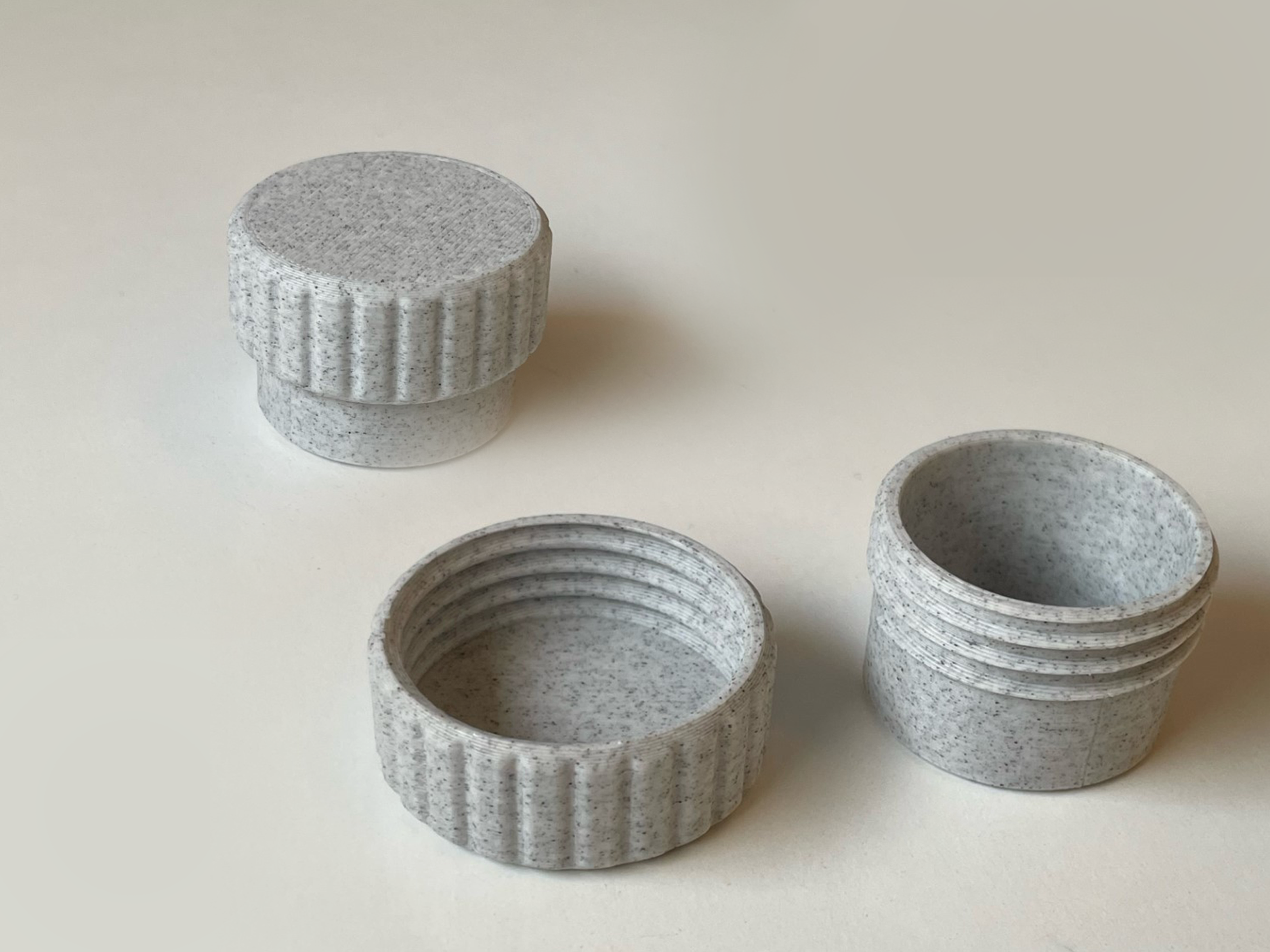 Threaded pill container