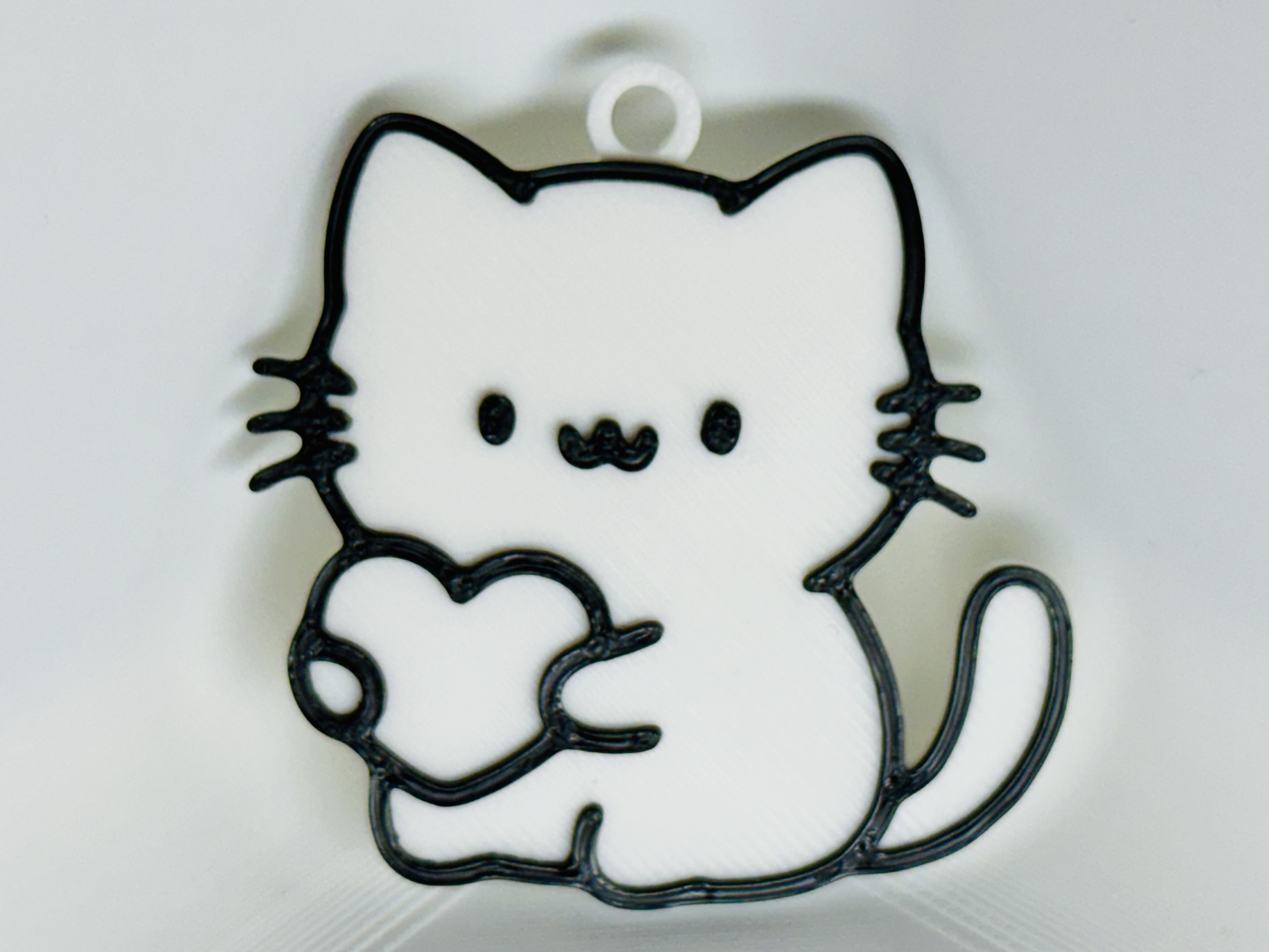 Cat Holding a Heart Keychain