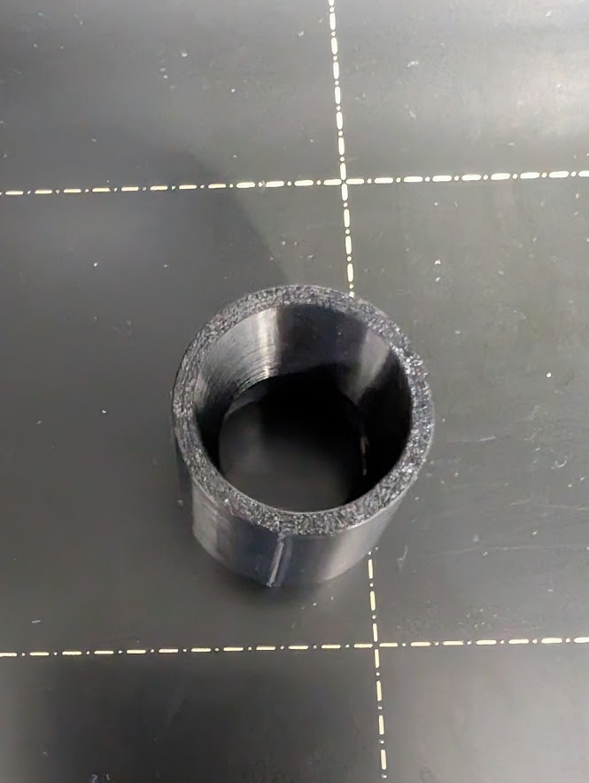 Clothes washer pump flow restrictor