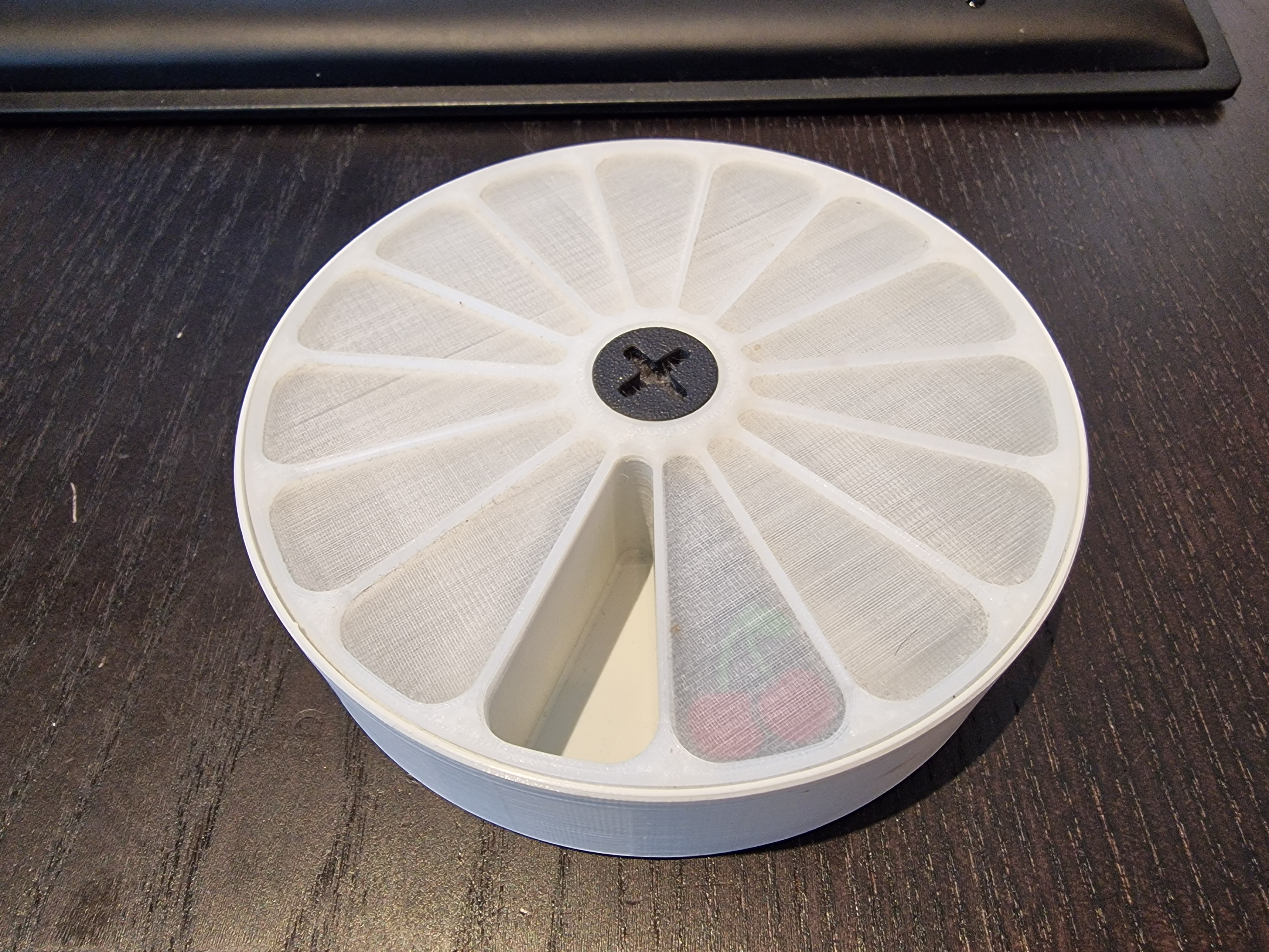 Circular pill box for 7 days, with screw on lid and secret compartment