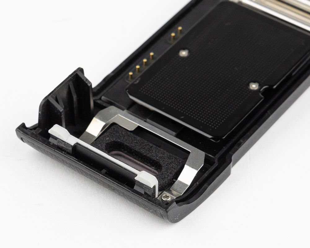 Nikon F100 back door latch