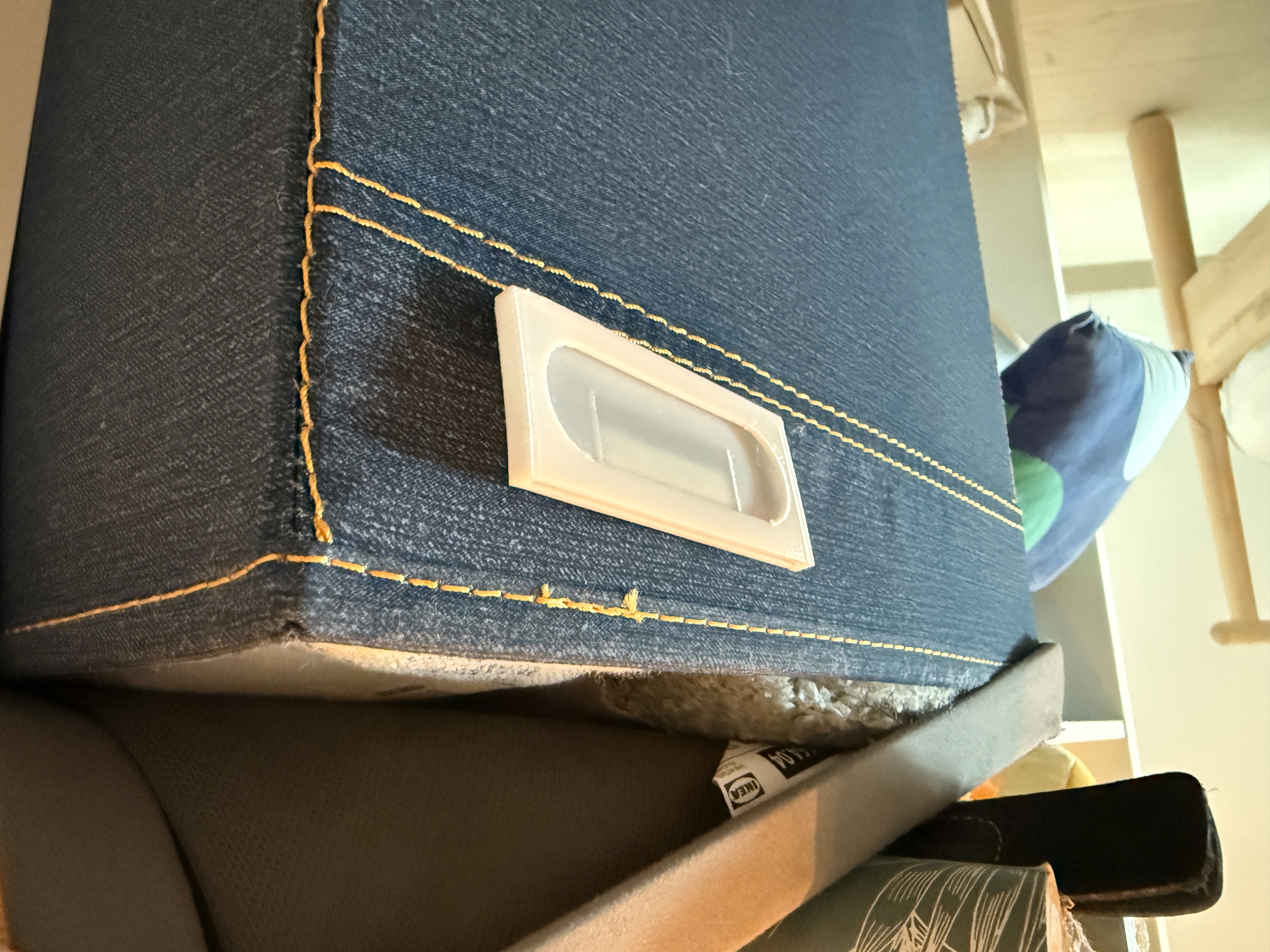 Label holder for textile box
