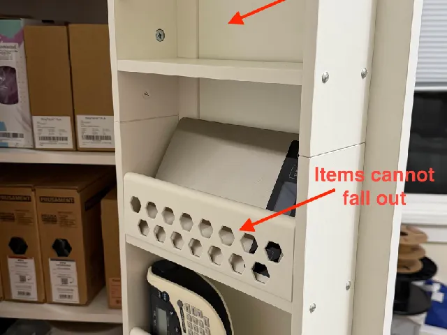 Spice rack rail guard for cabinet door