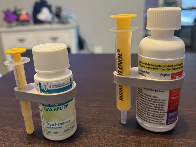 Mylicon and Tylenol baby syringe holders