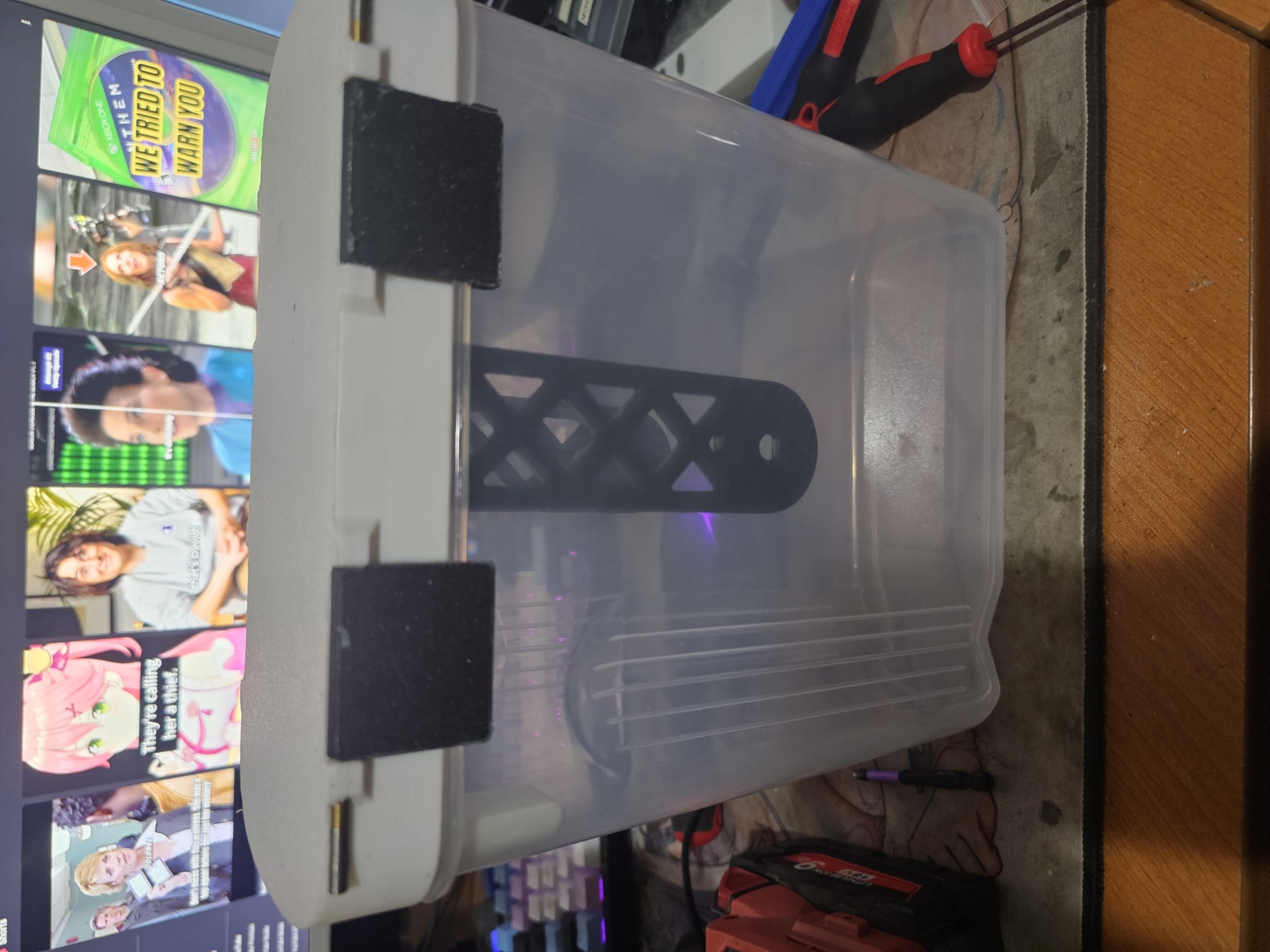 Remixes of the lid for 2026 filament storage with seperate latches.