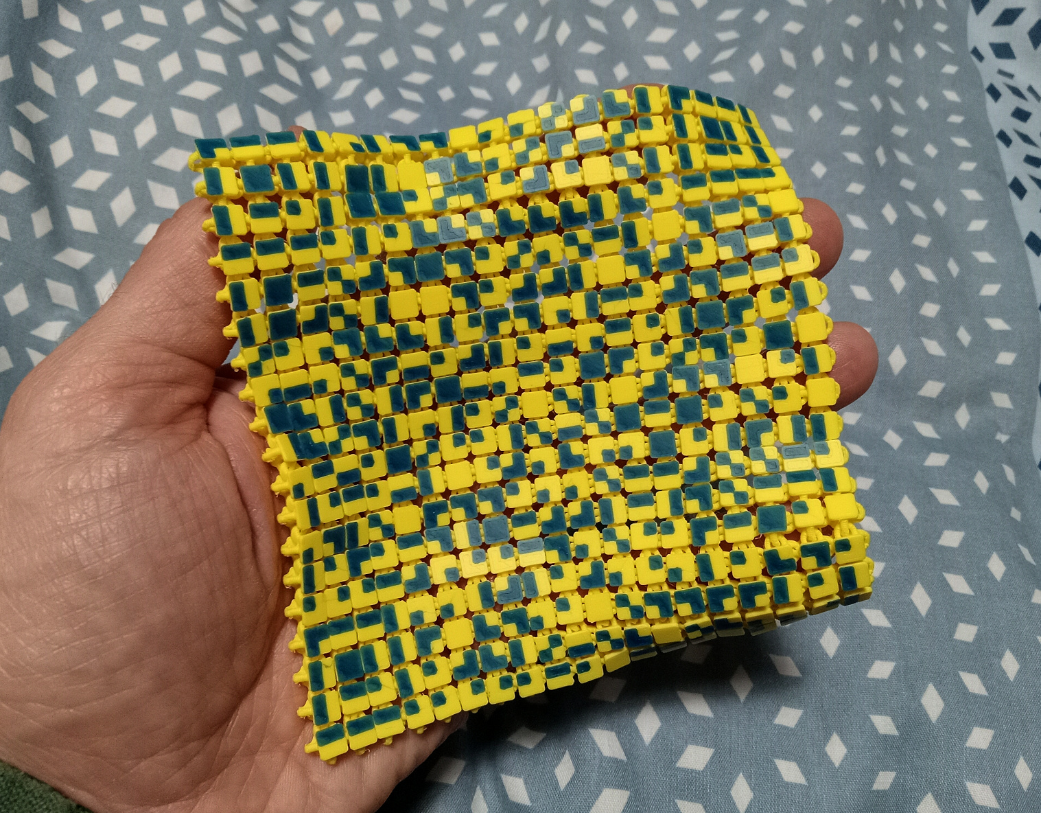 Self-referential QR code fabric