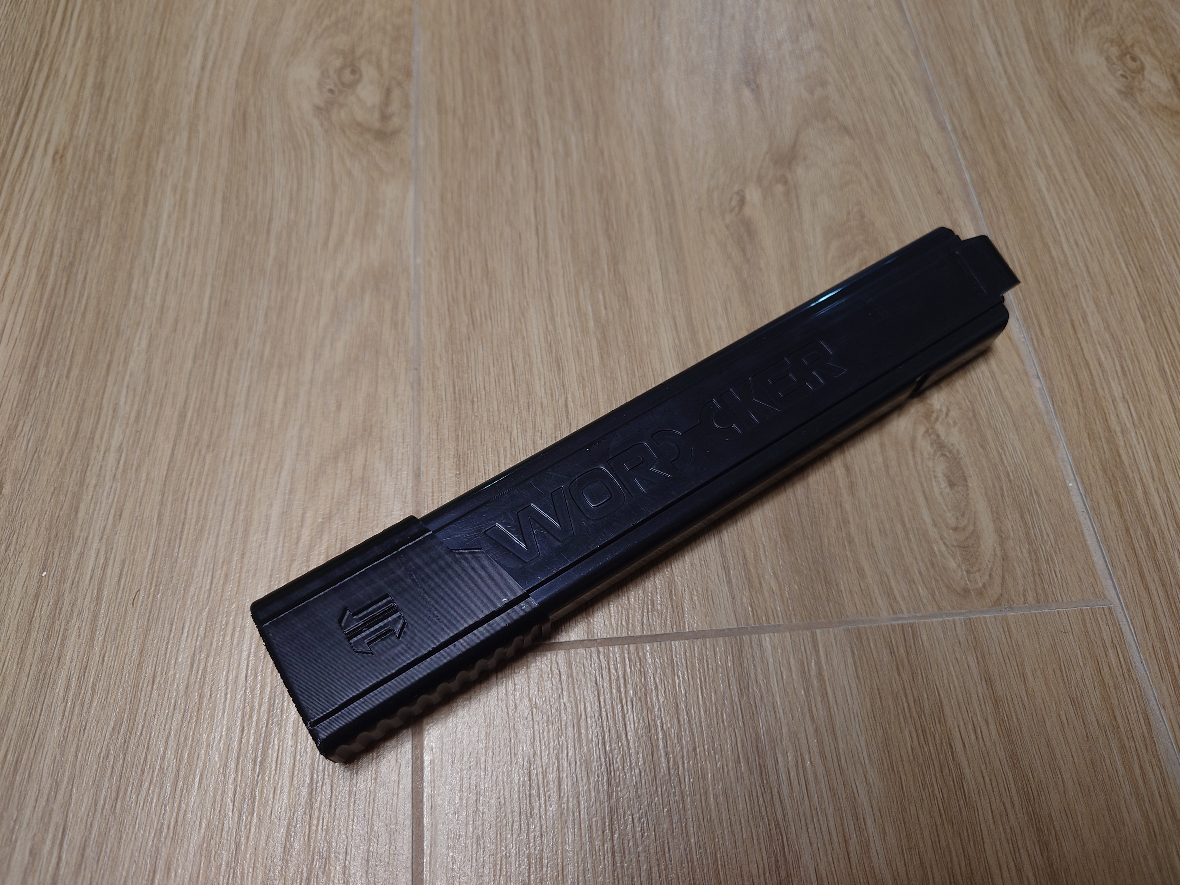 Slim angled talon mag extender