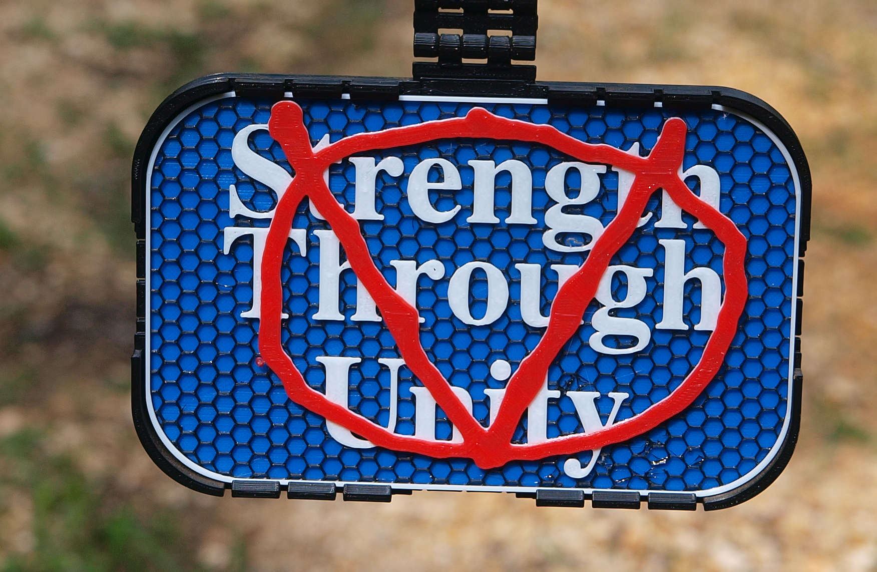 V for Vendetta / Strength through Unity sign