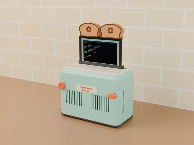 Framework 12 Toaster PC: push the lever, the screen pops up like toast