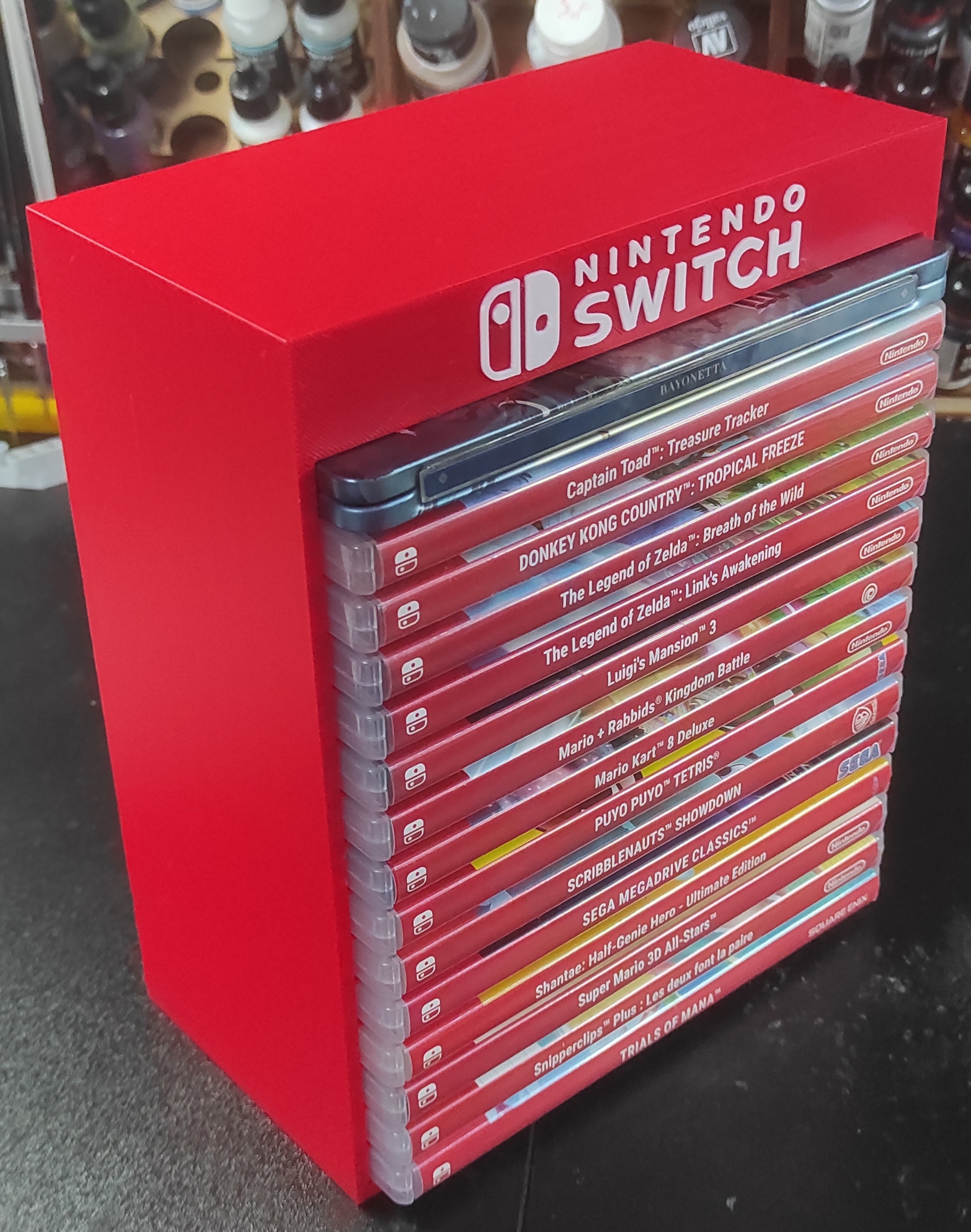 Vertical game stand for Nintendo Switch.
