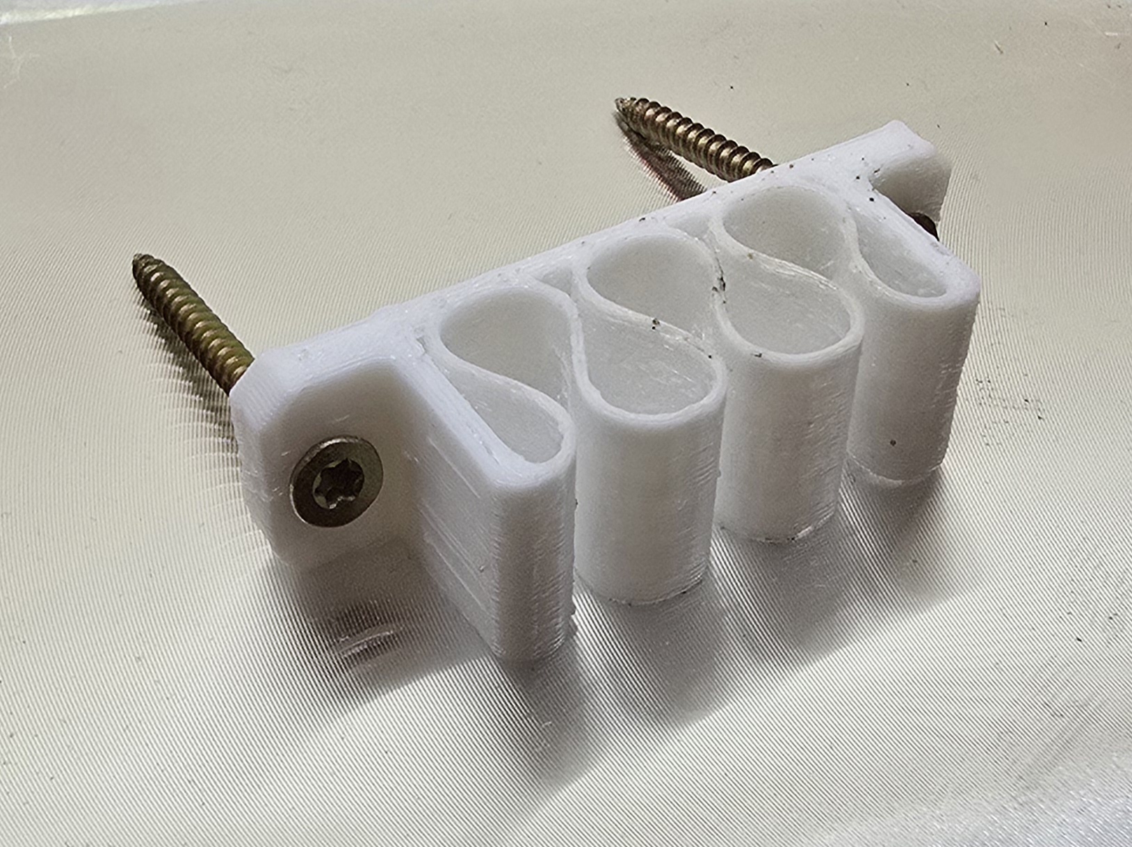 UniversalCableHolder_3_slots_3mm_holes