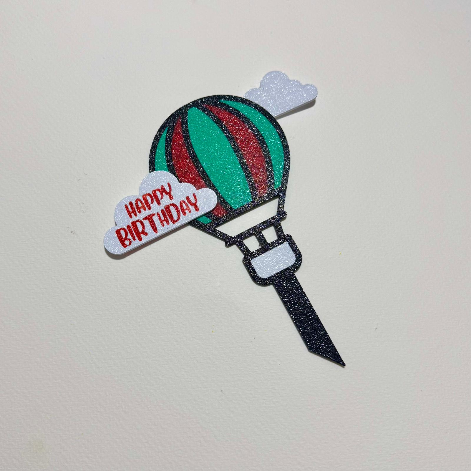 Hot air balloon themed “Happy Birthday” cake topper
