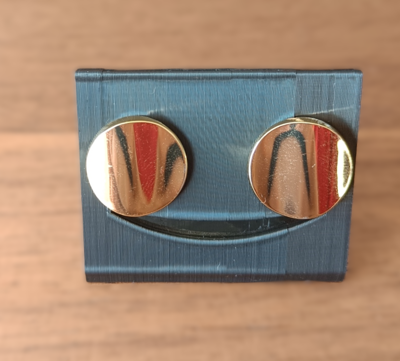 Smiley cufflink holder