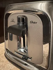 Oster 2-slice toaster button
