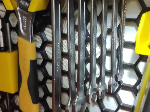 Open-end wrench holder.