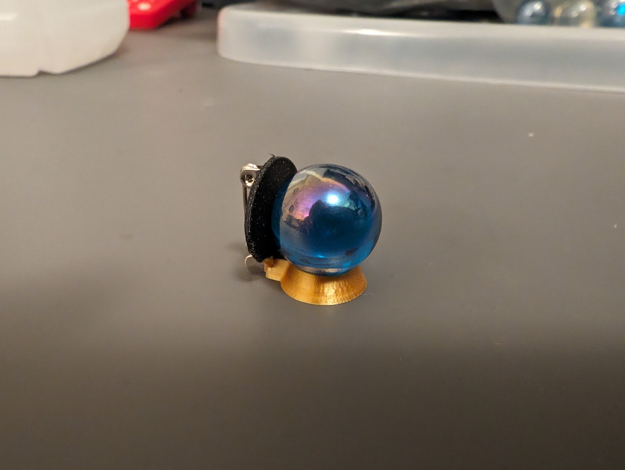 Orb holder pin (crystal ball)