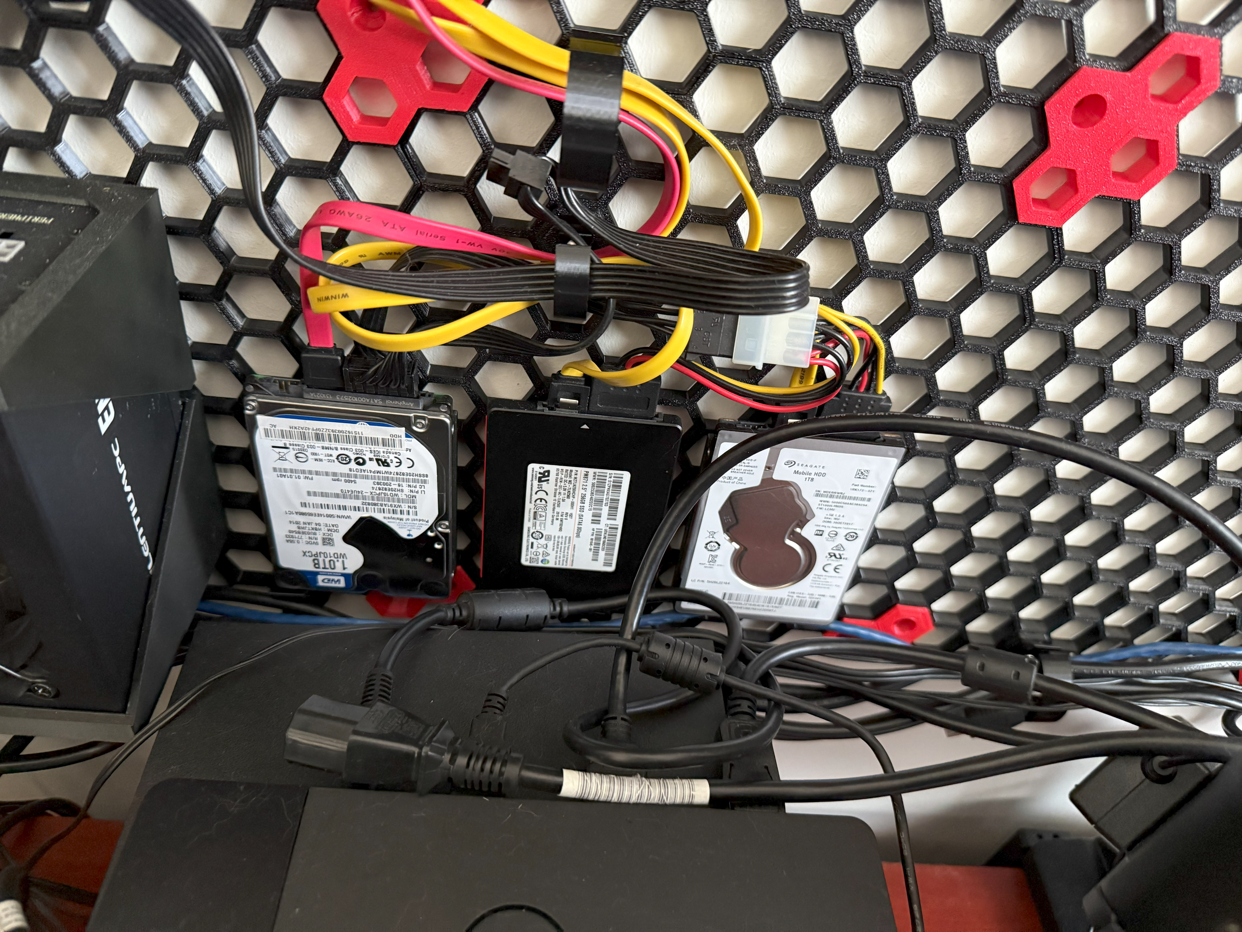 Honeycomb Storage Wall simple cable holders and more.