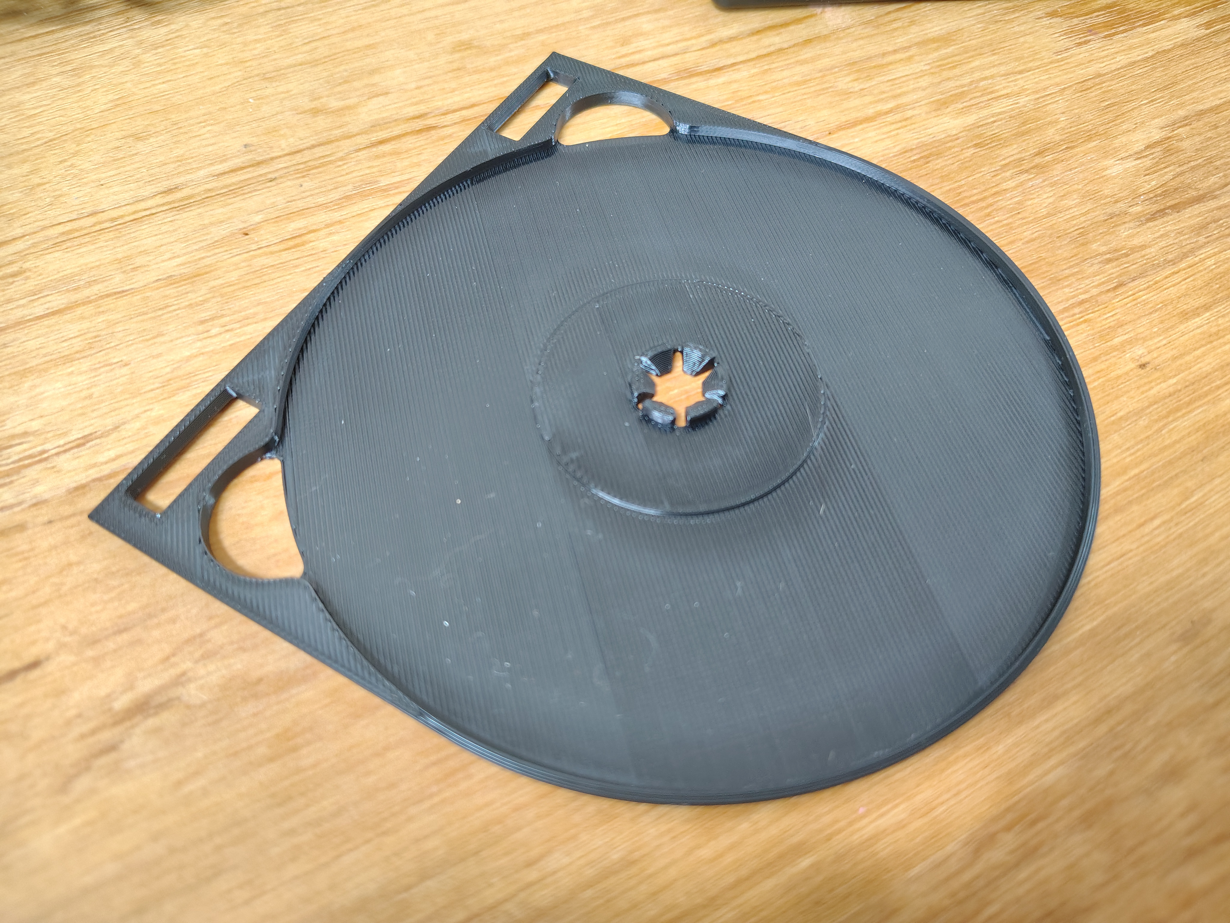 Optical disc swing tray insert for DVD and Bluray cases.