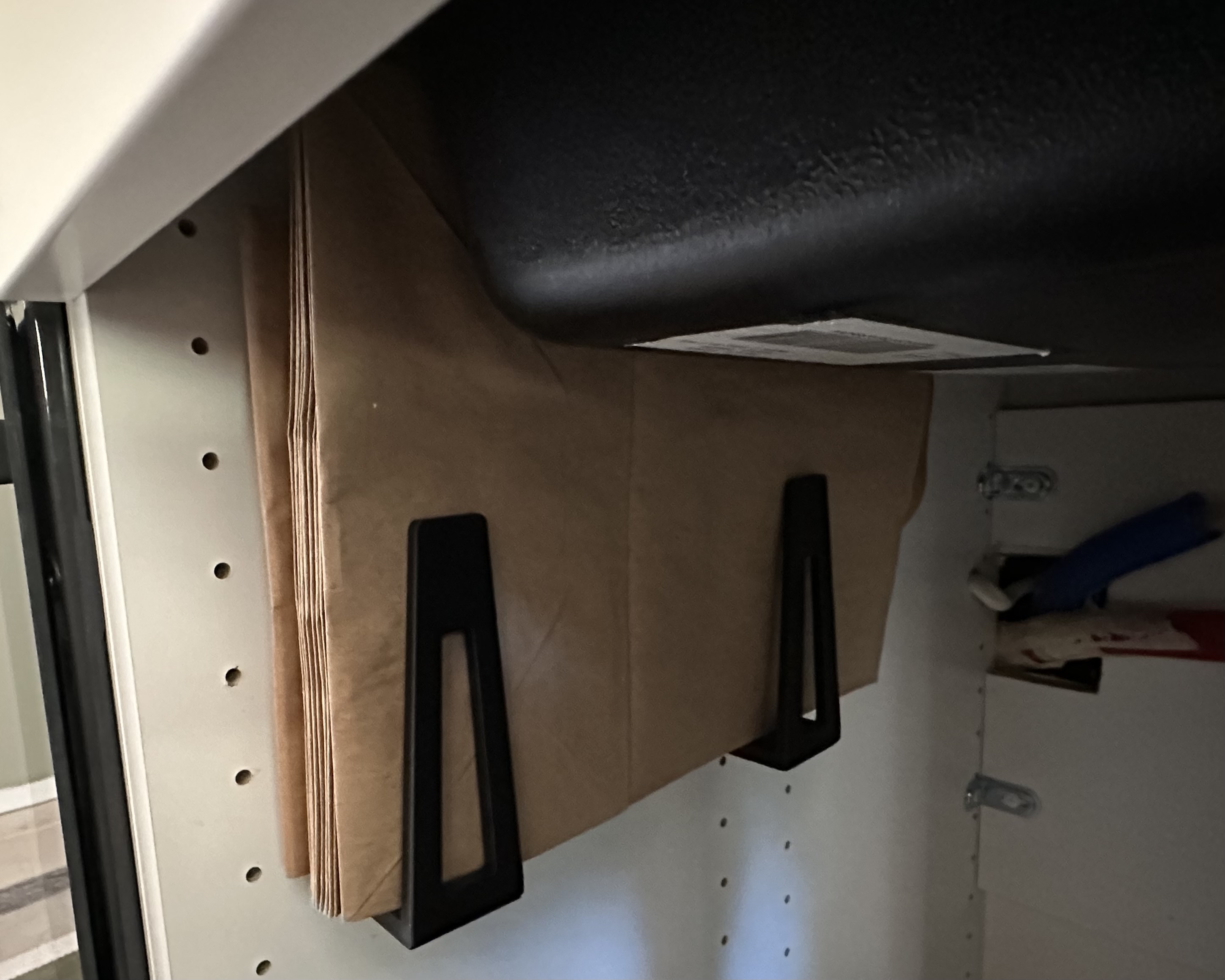 Compact paper bag holder for biowaste bags
