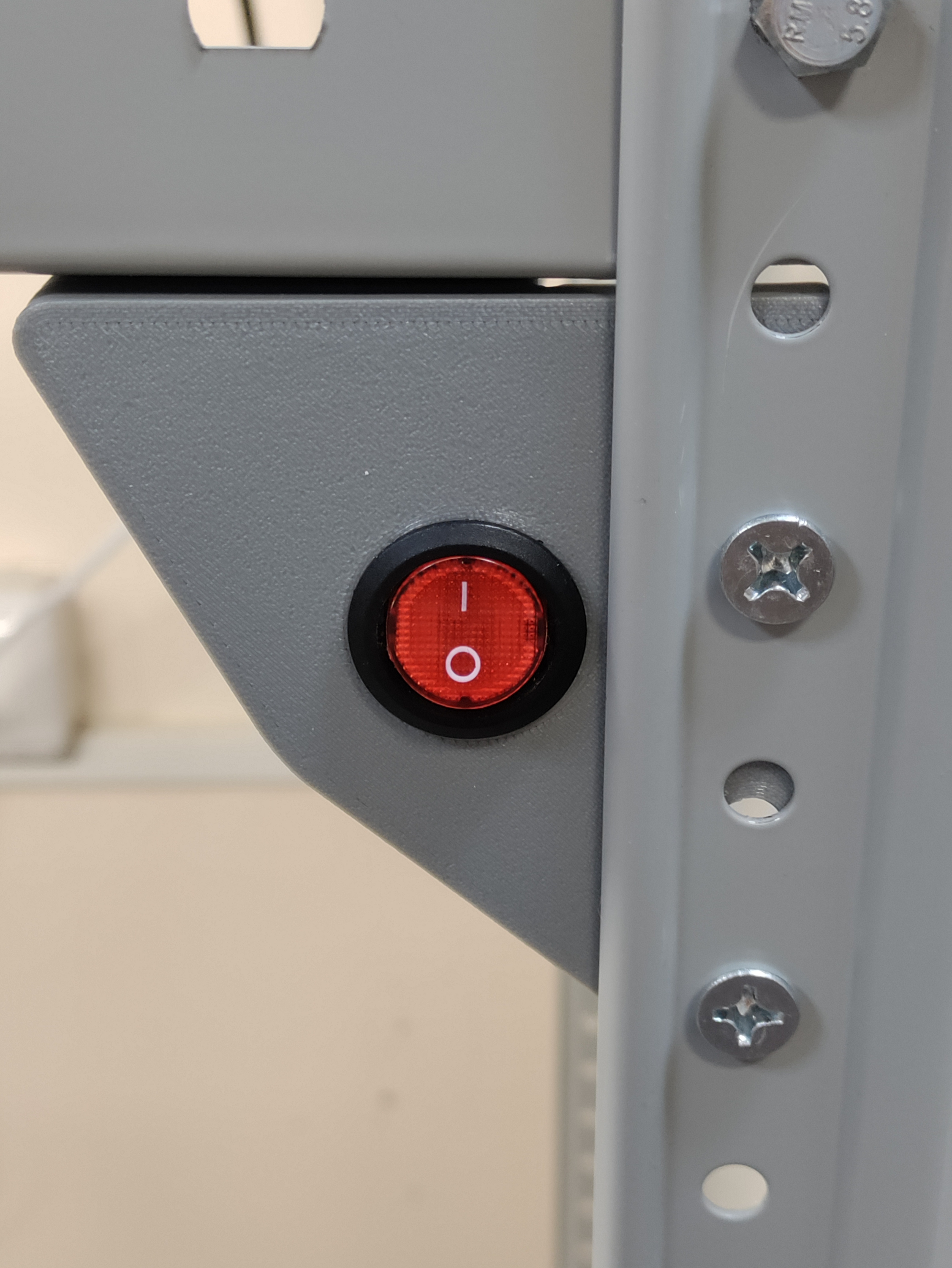 Toggle switch bracket for rack mounting