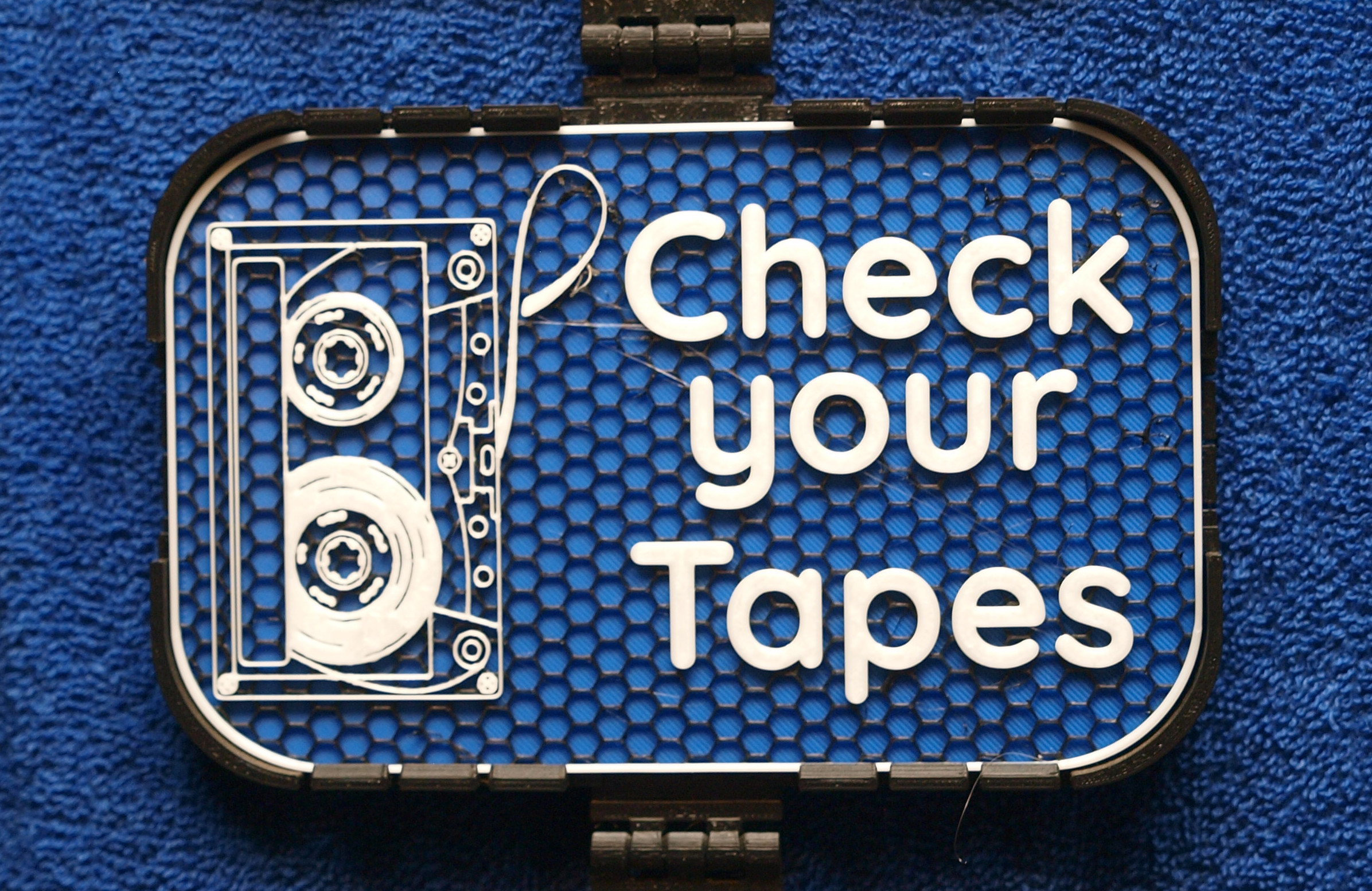 Check your Tapes sign