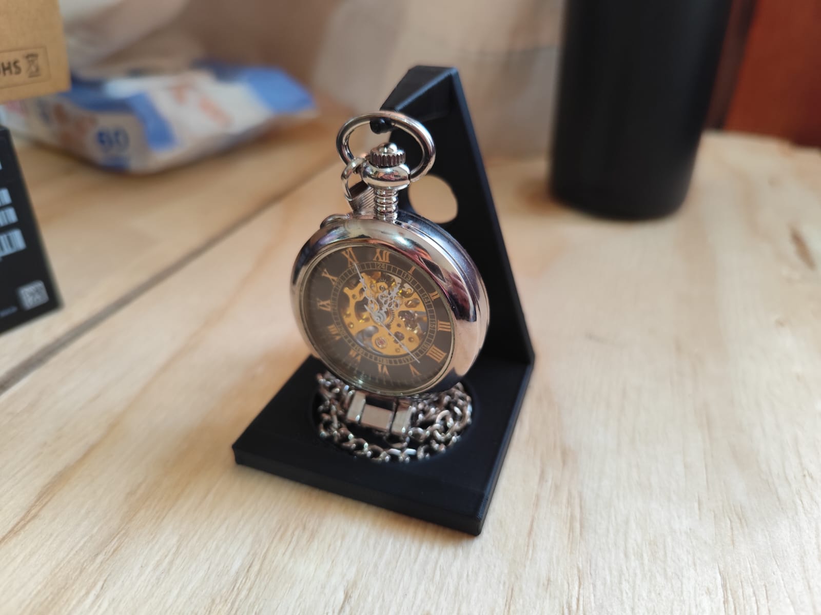 Pocket watch stand with solid bottom