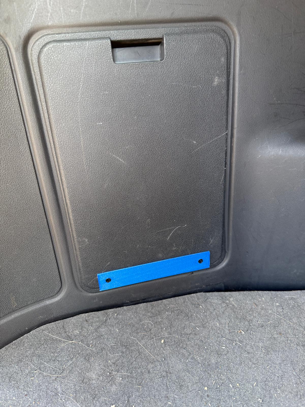 Ford Escort trunk cover repair
