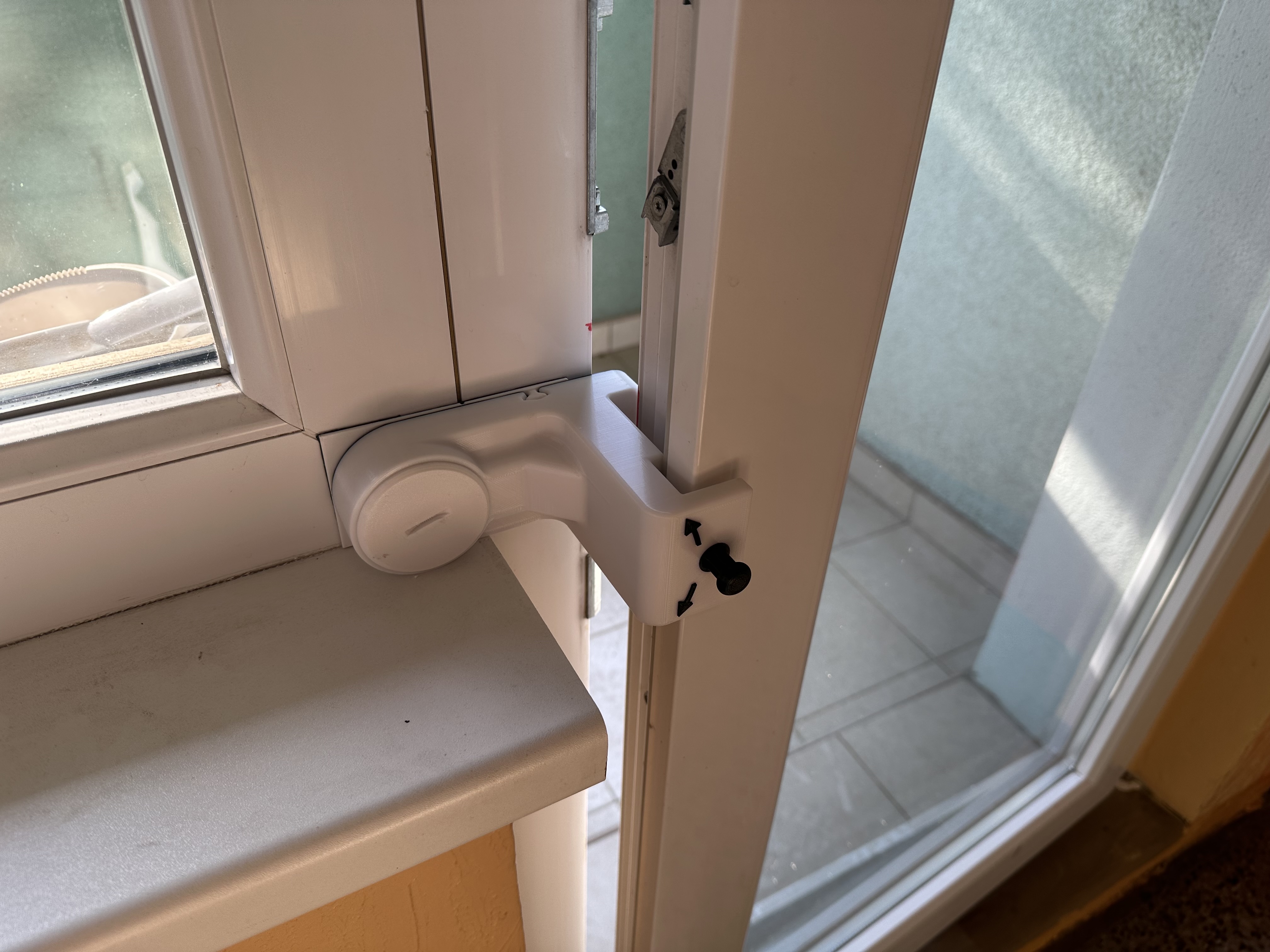 Balcony door stopper
