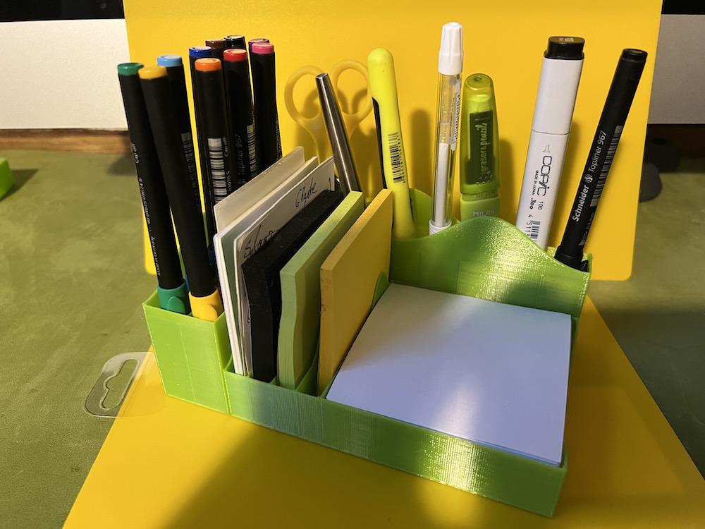 Stationery holder for paper, Post-It stickers, pencils, and pens
