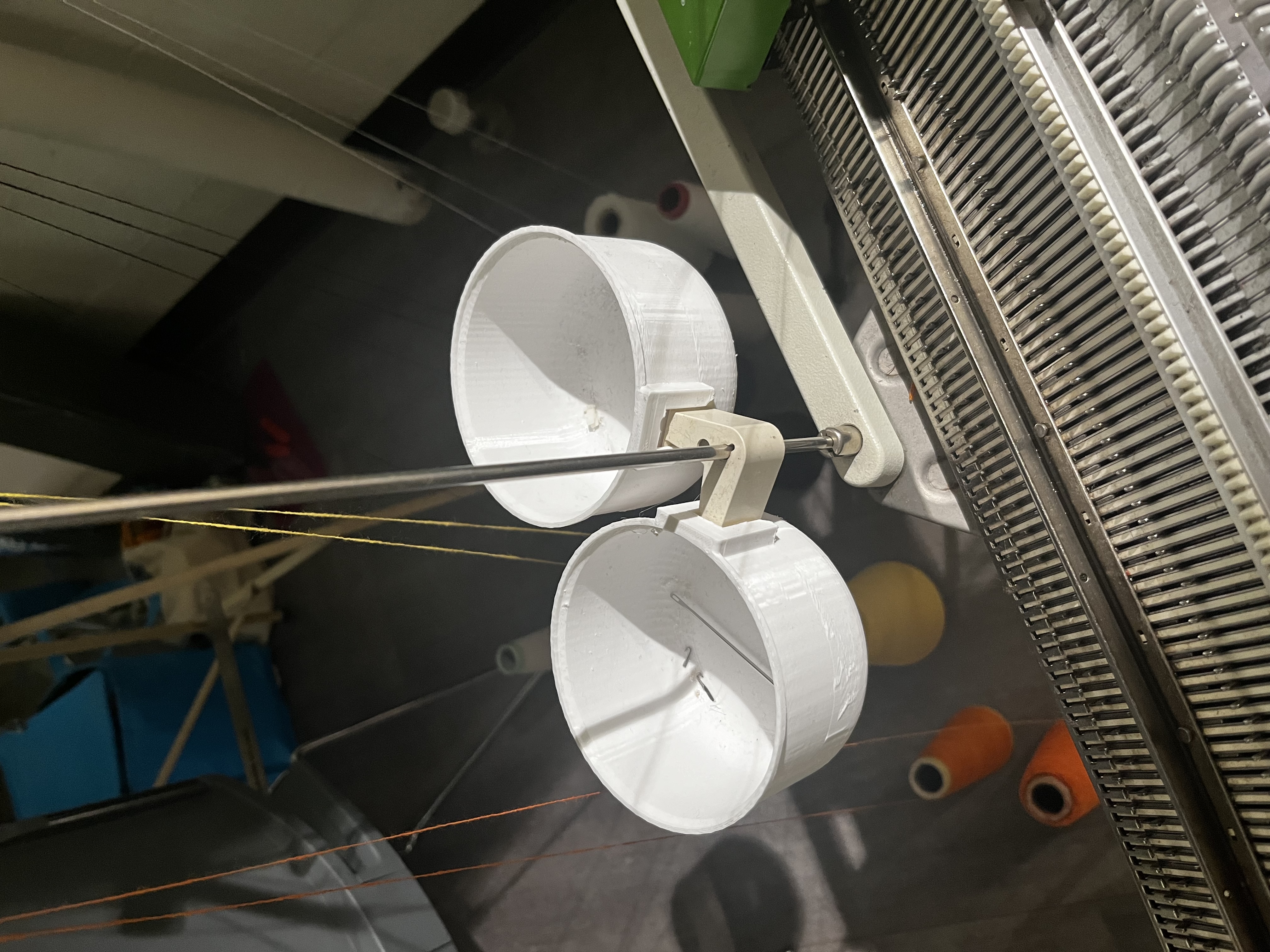 Cup for knitting machine
