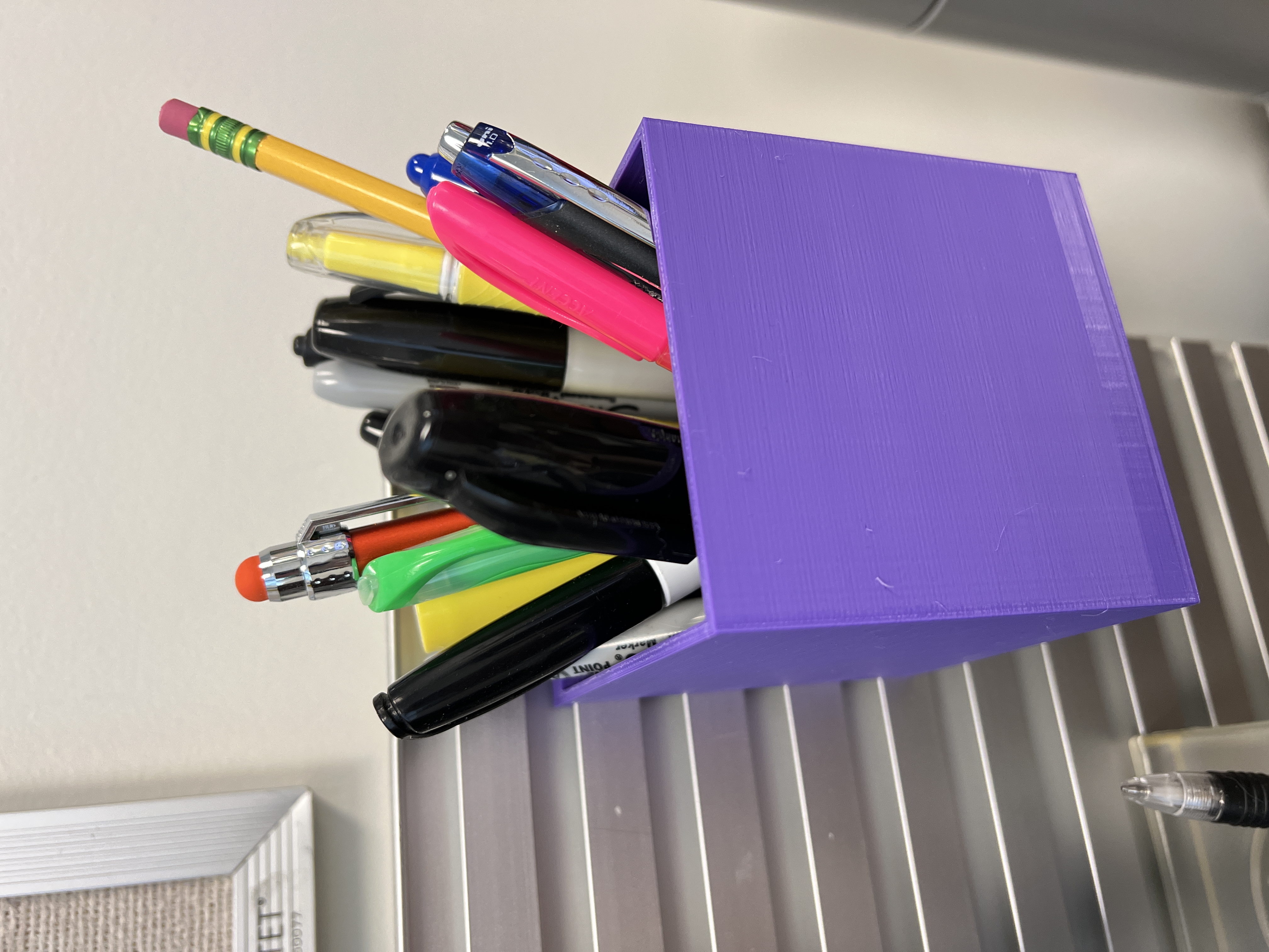Desk caddy for Steelcase brand slatwall or slatrail.