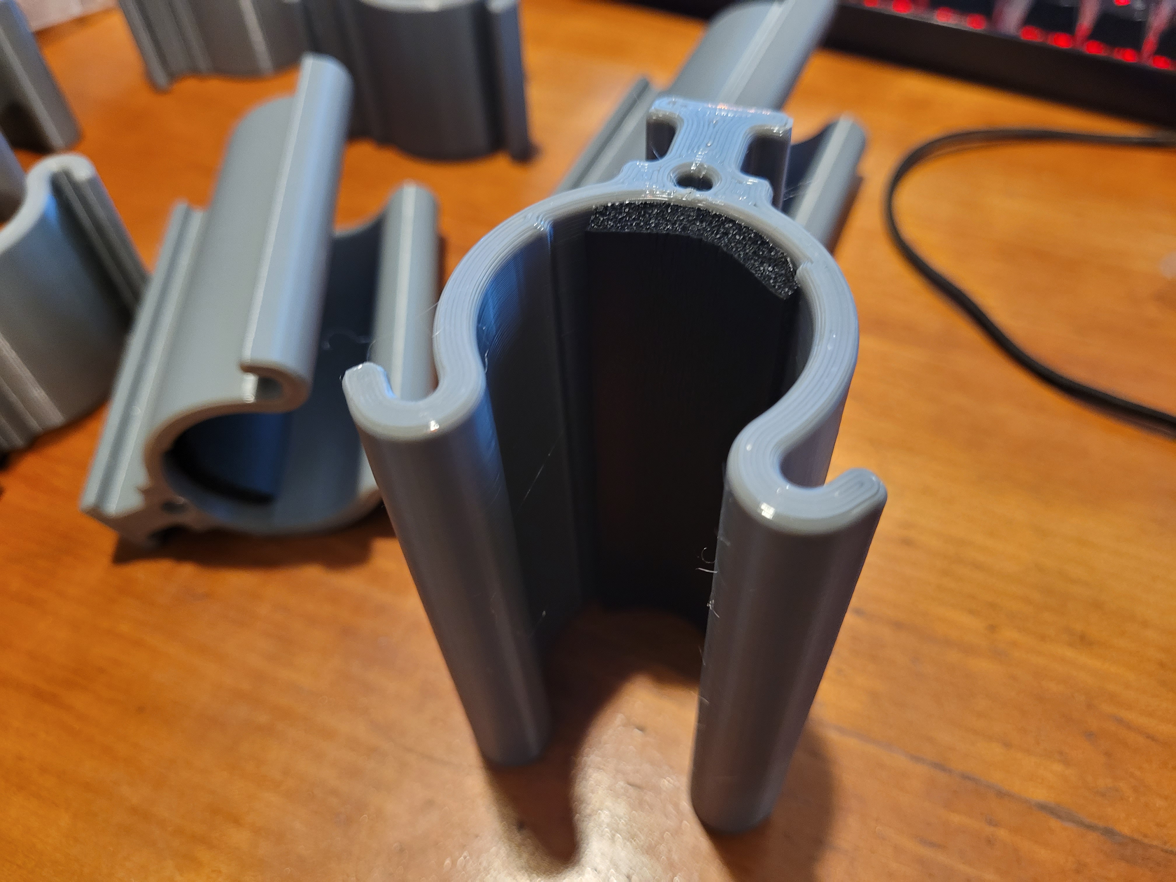 Greenhouse film/tarp clip retainer for pipe frame