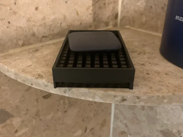 A water draining soap holder
