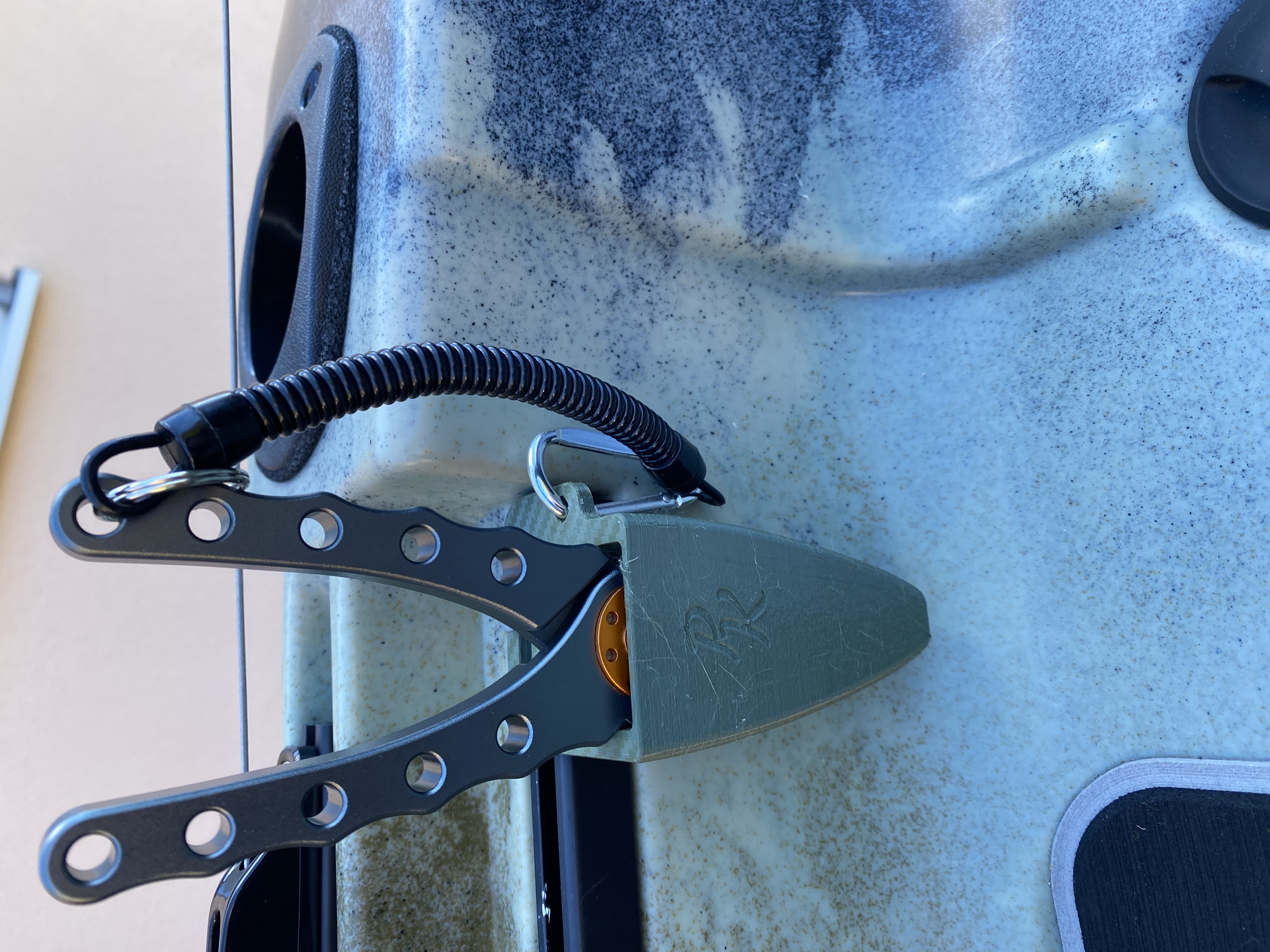 Kayak pliers holder