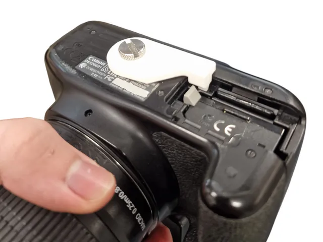 Battery Door Button Bypass (Canon)