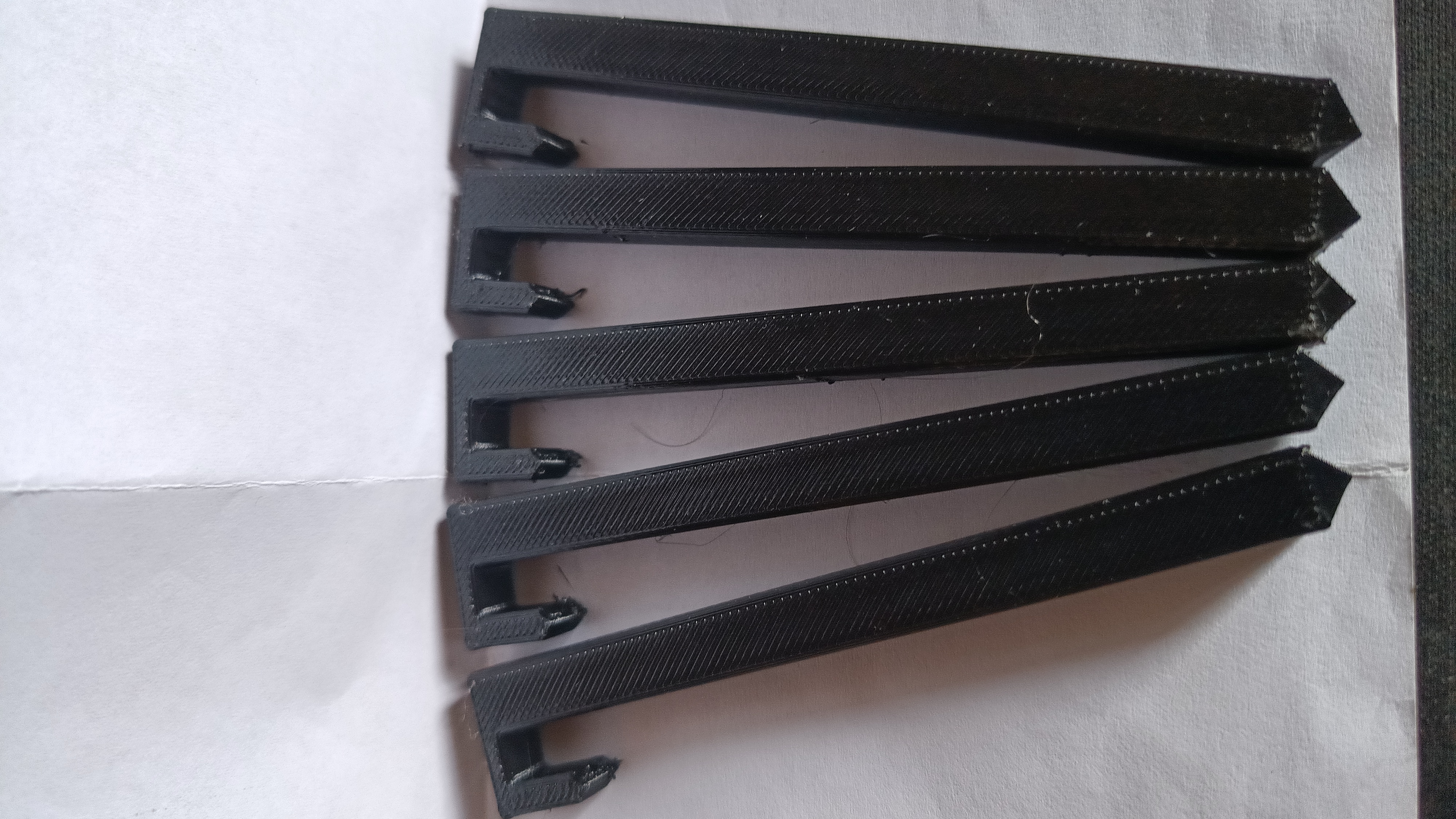 Boundary wire peg for robotic lawn mower