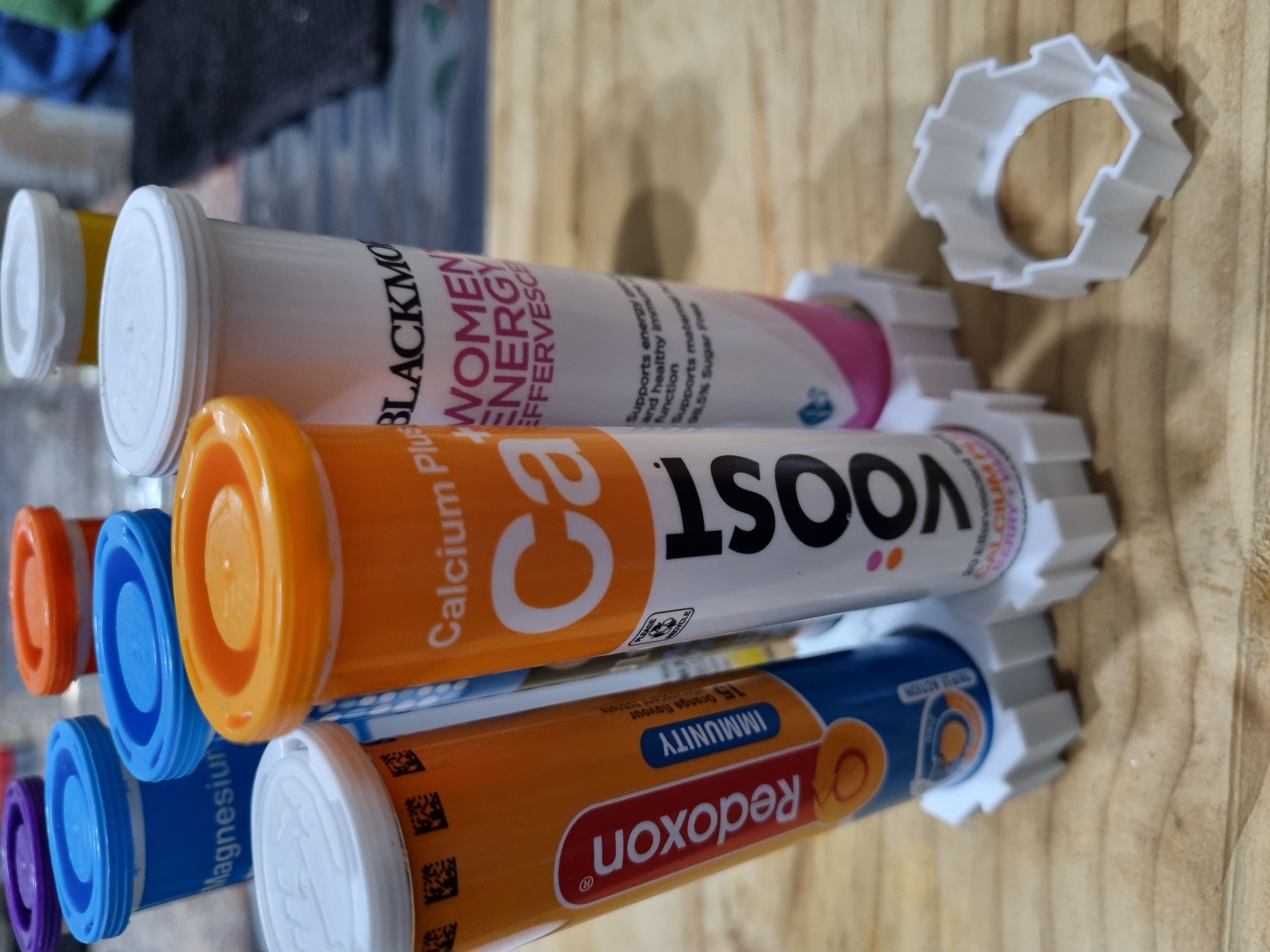 Vitamin effervescent tablet modular holder/stand.  Very small print. Fits most brands.