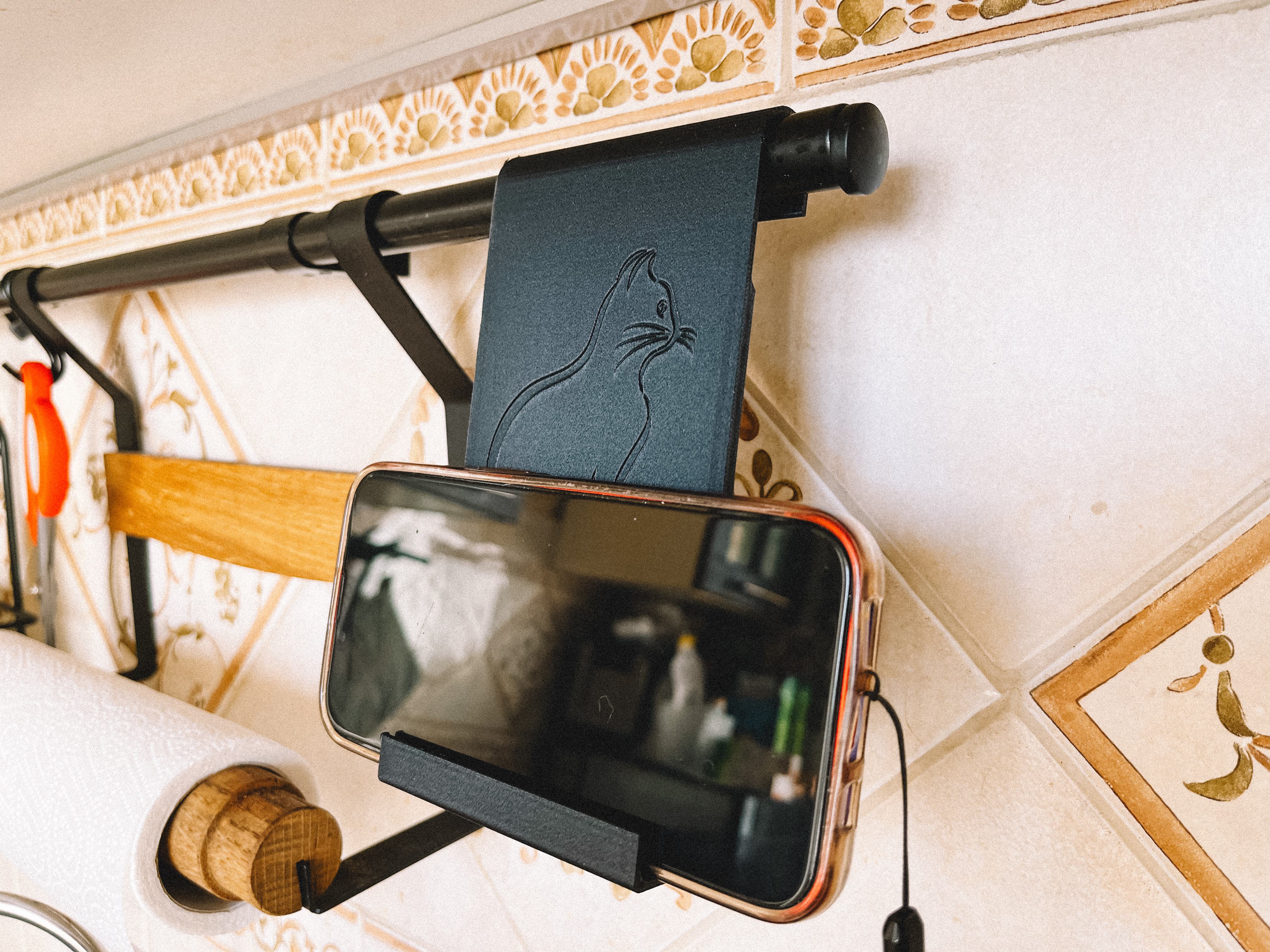 Kitchen rail phone holder