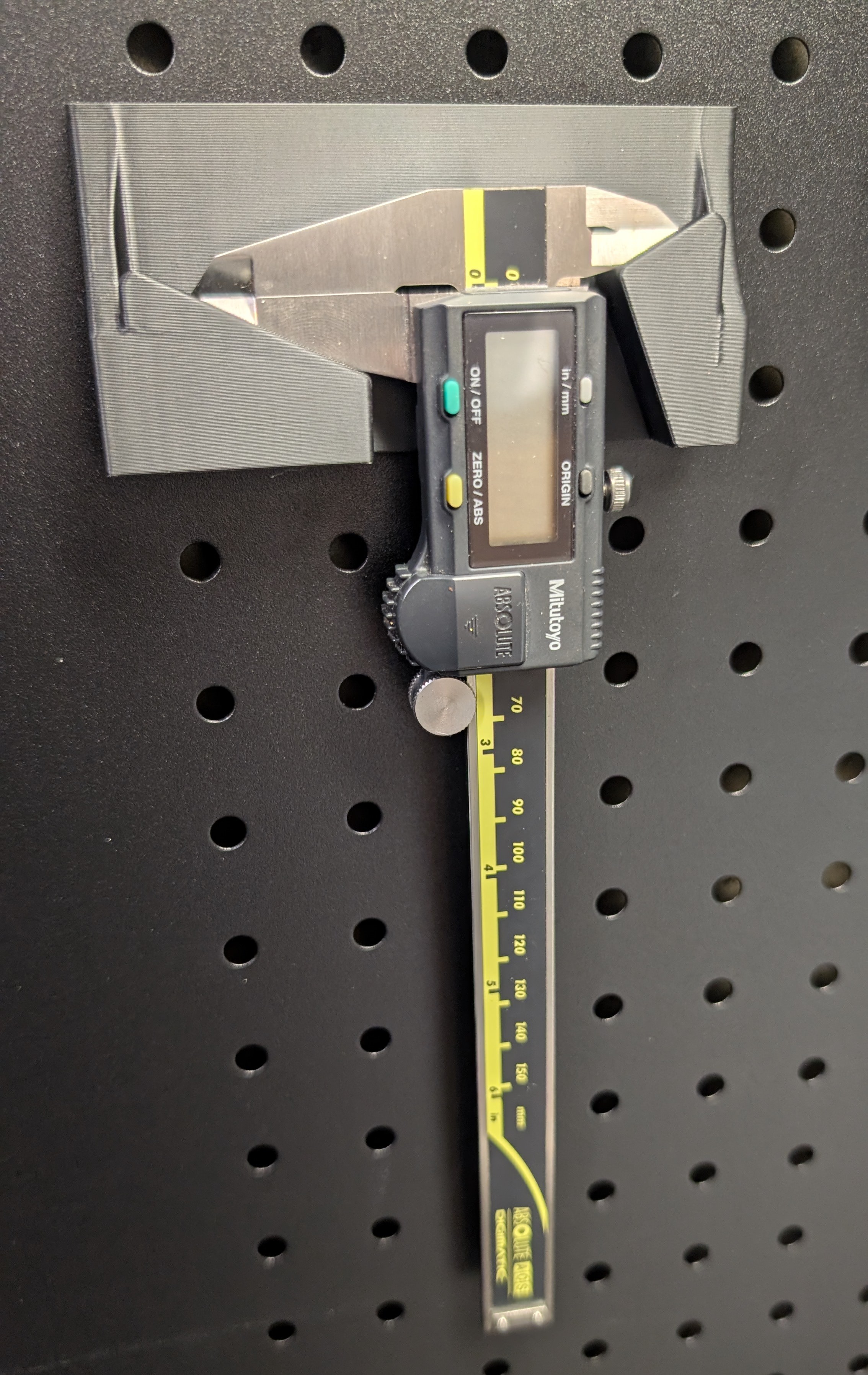 Caliper storage for Sy's peglock system