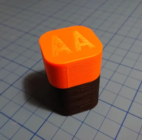 Battery container for four AA batteries
