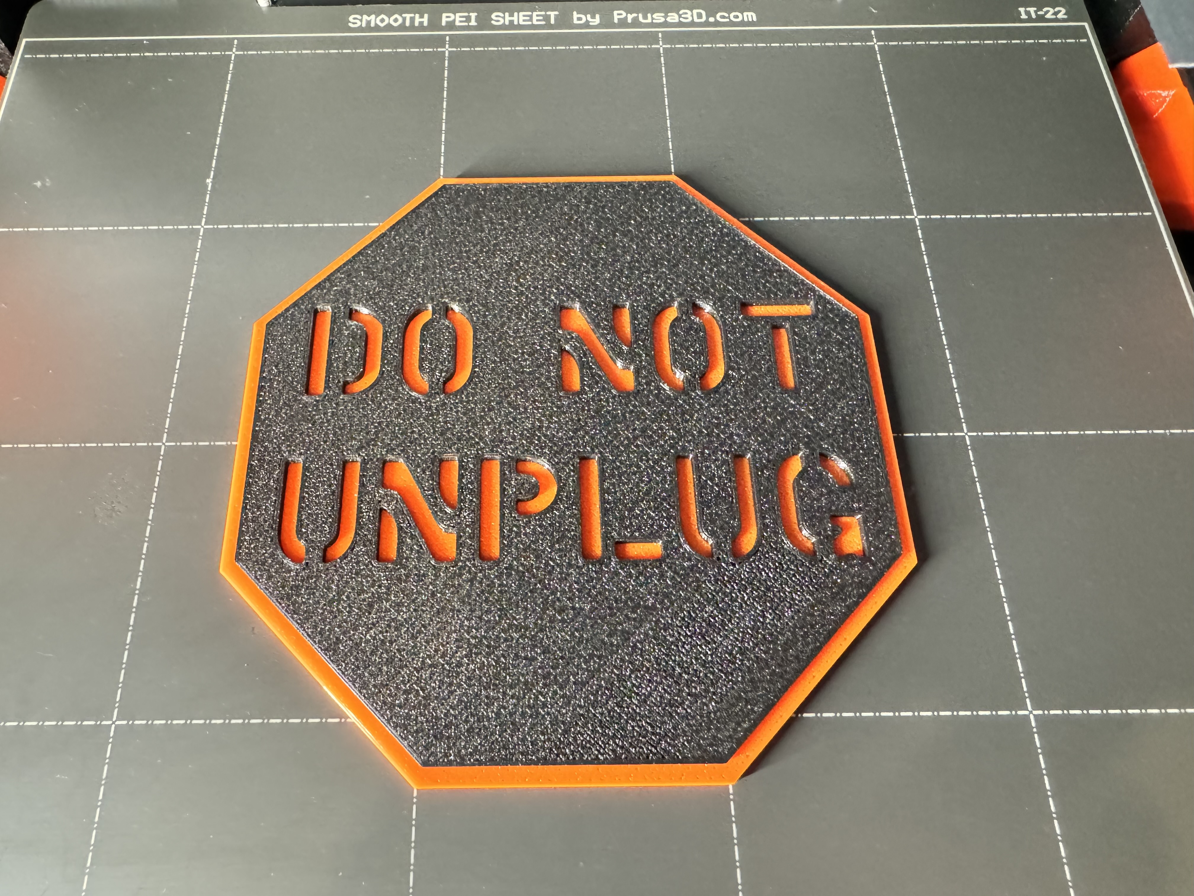 Do Not Unplug sign / warning