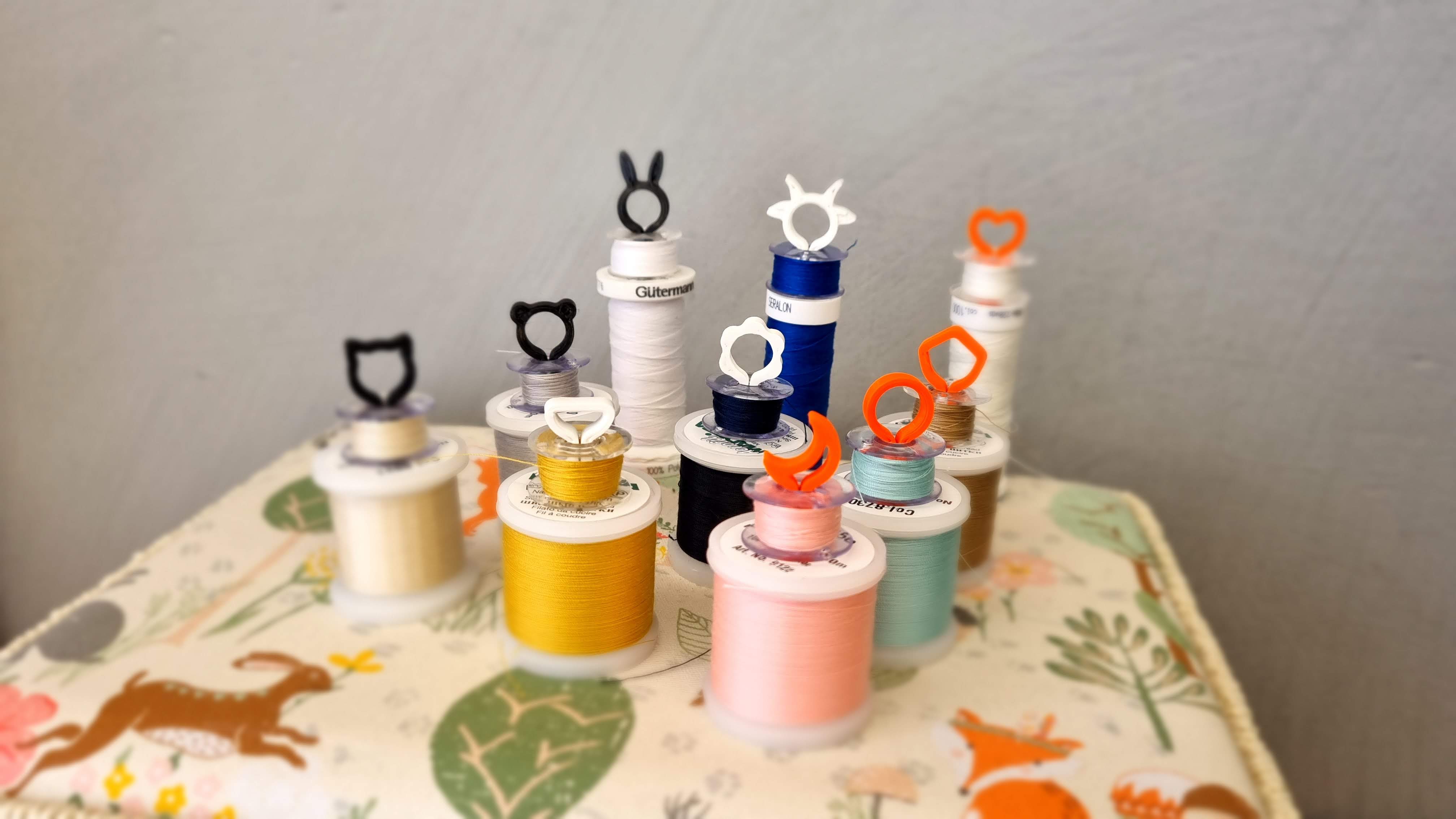 Spool & bobbin holder for convenient thread matched storage