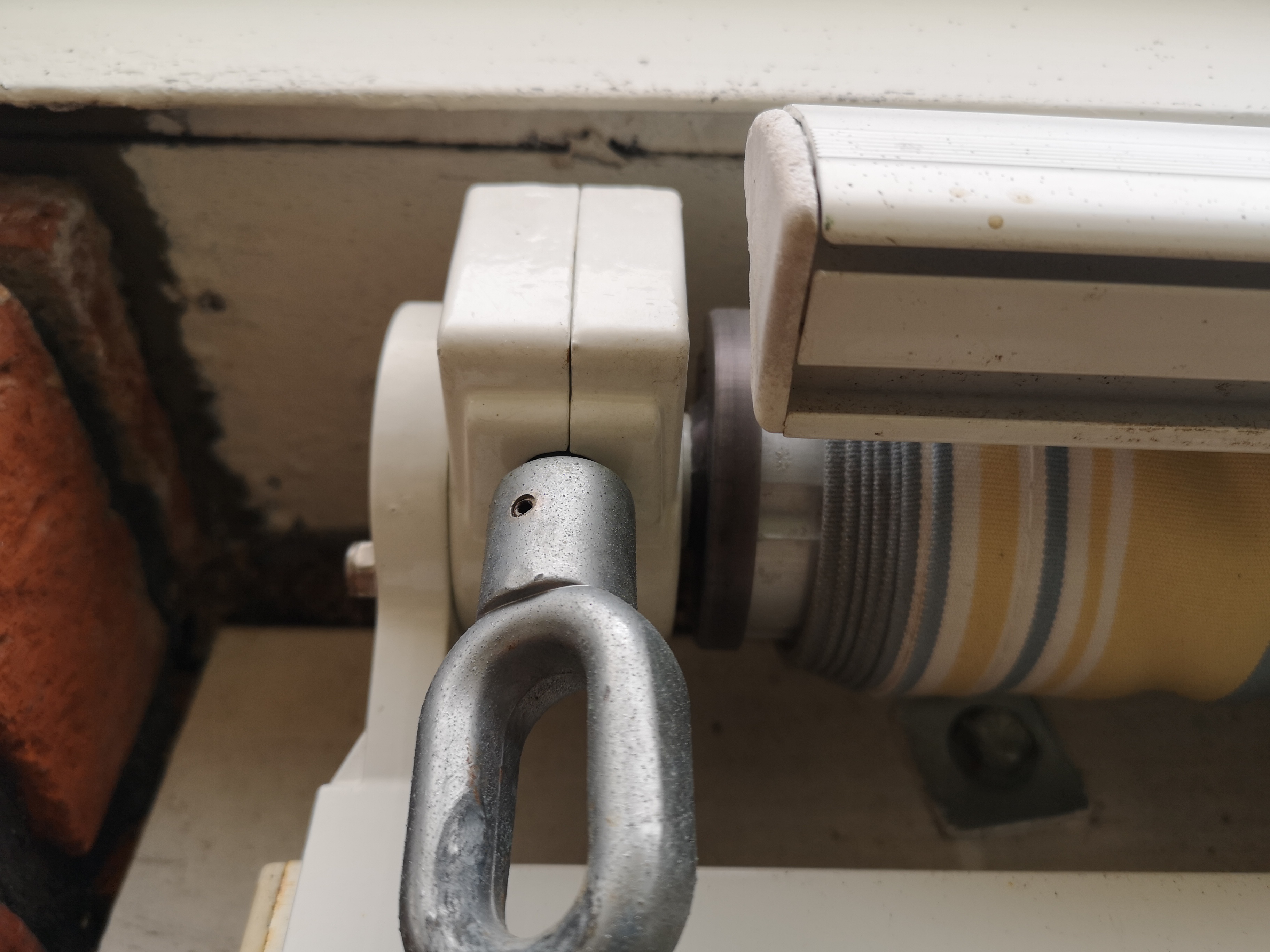 Crank end of awning