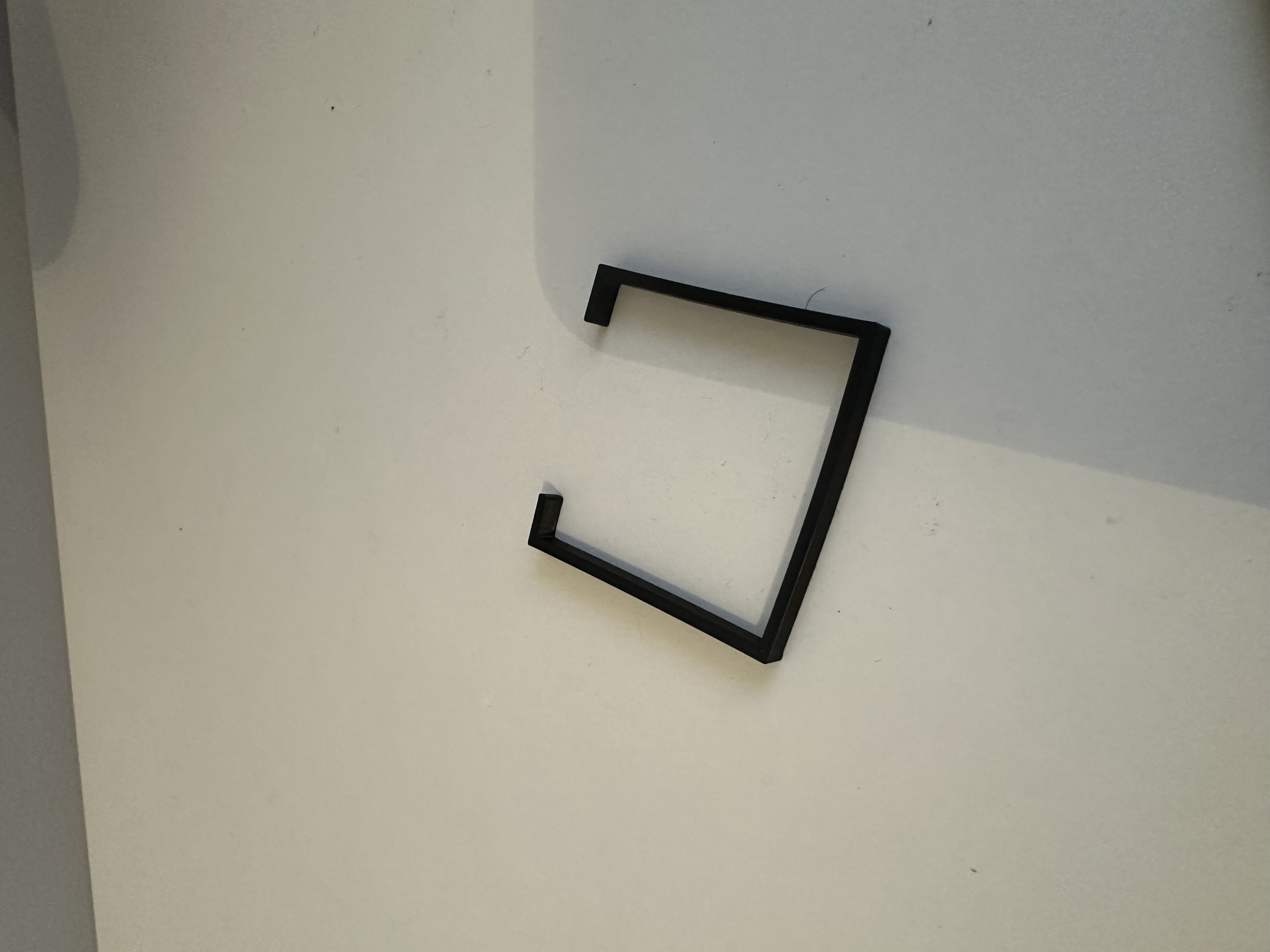 Low profile mic arm cable clip