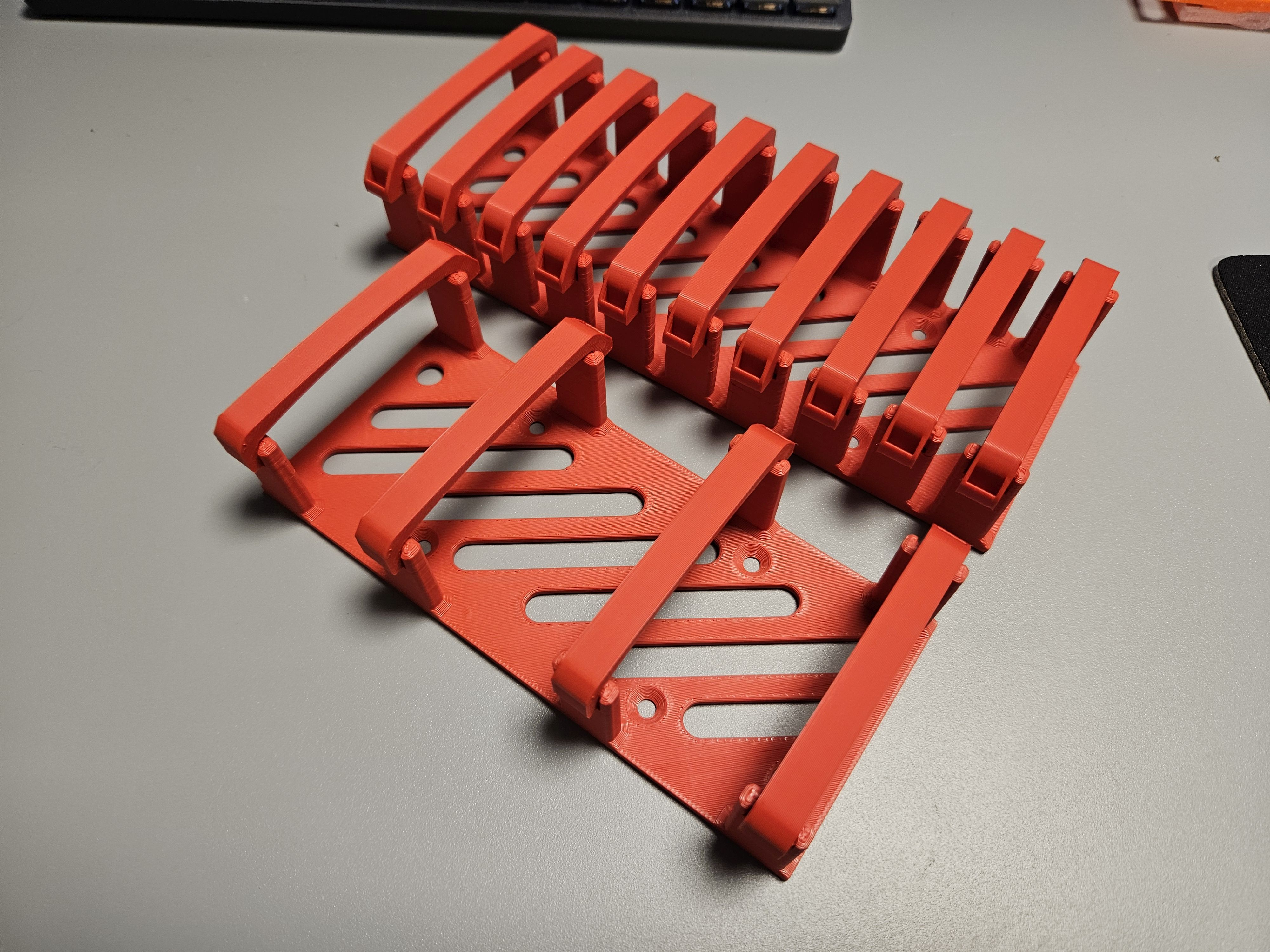 Modular wire management tray with wider gaps