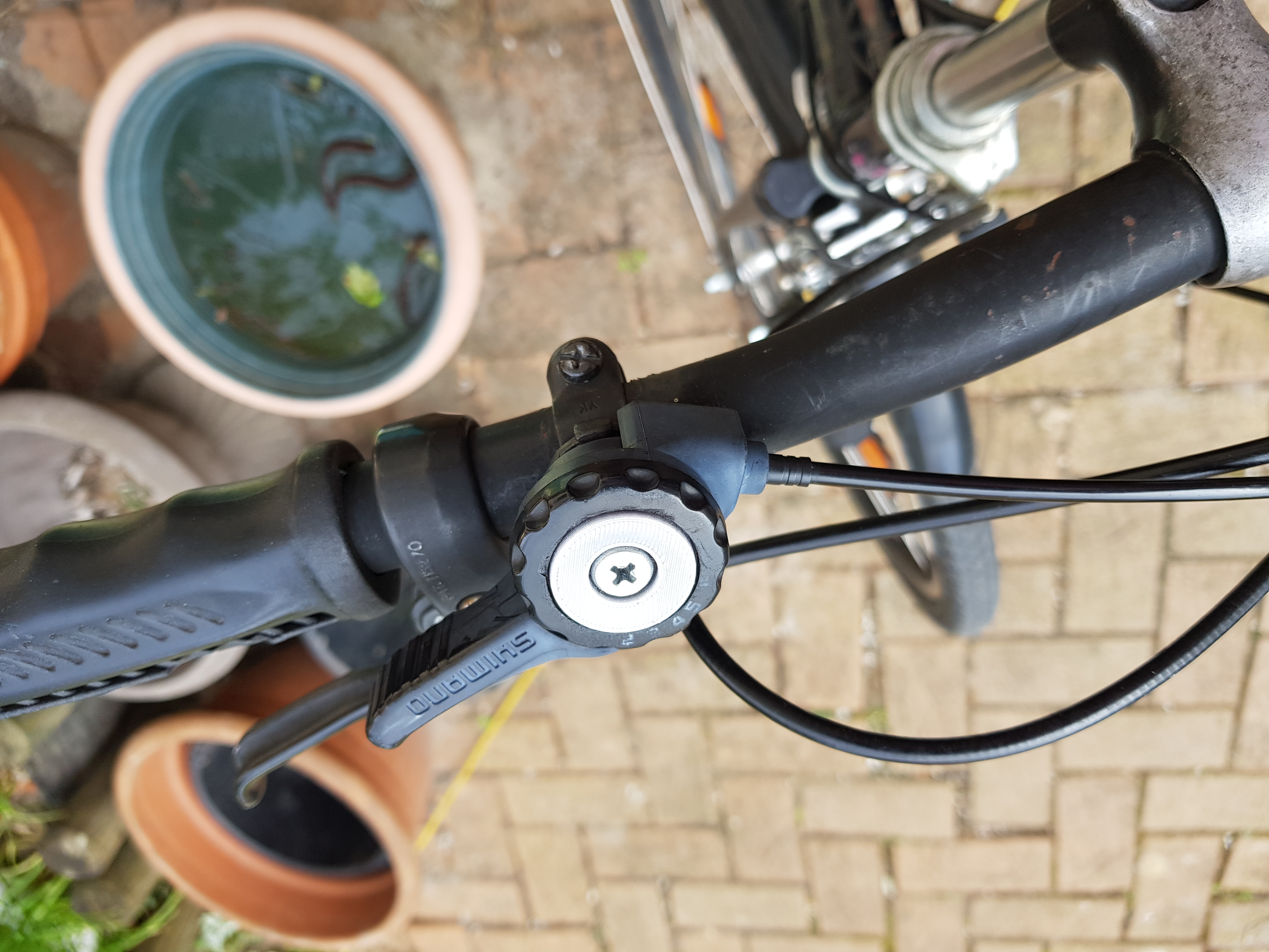 sehr alter Shimano_Schalthebel-Deckel