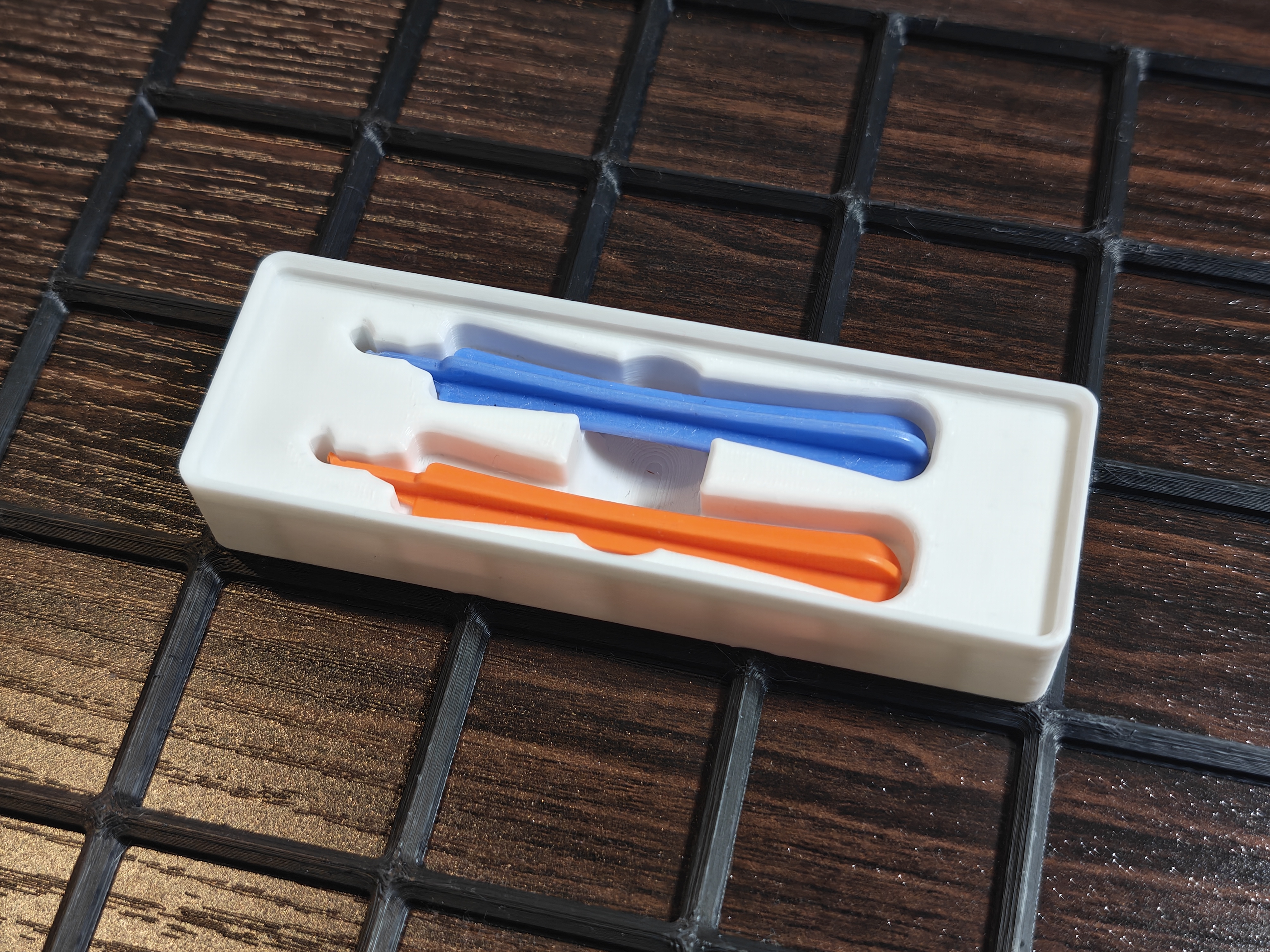 Case opening tool / spudger holder (Gridfinity 3×1×3 stackable)