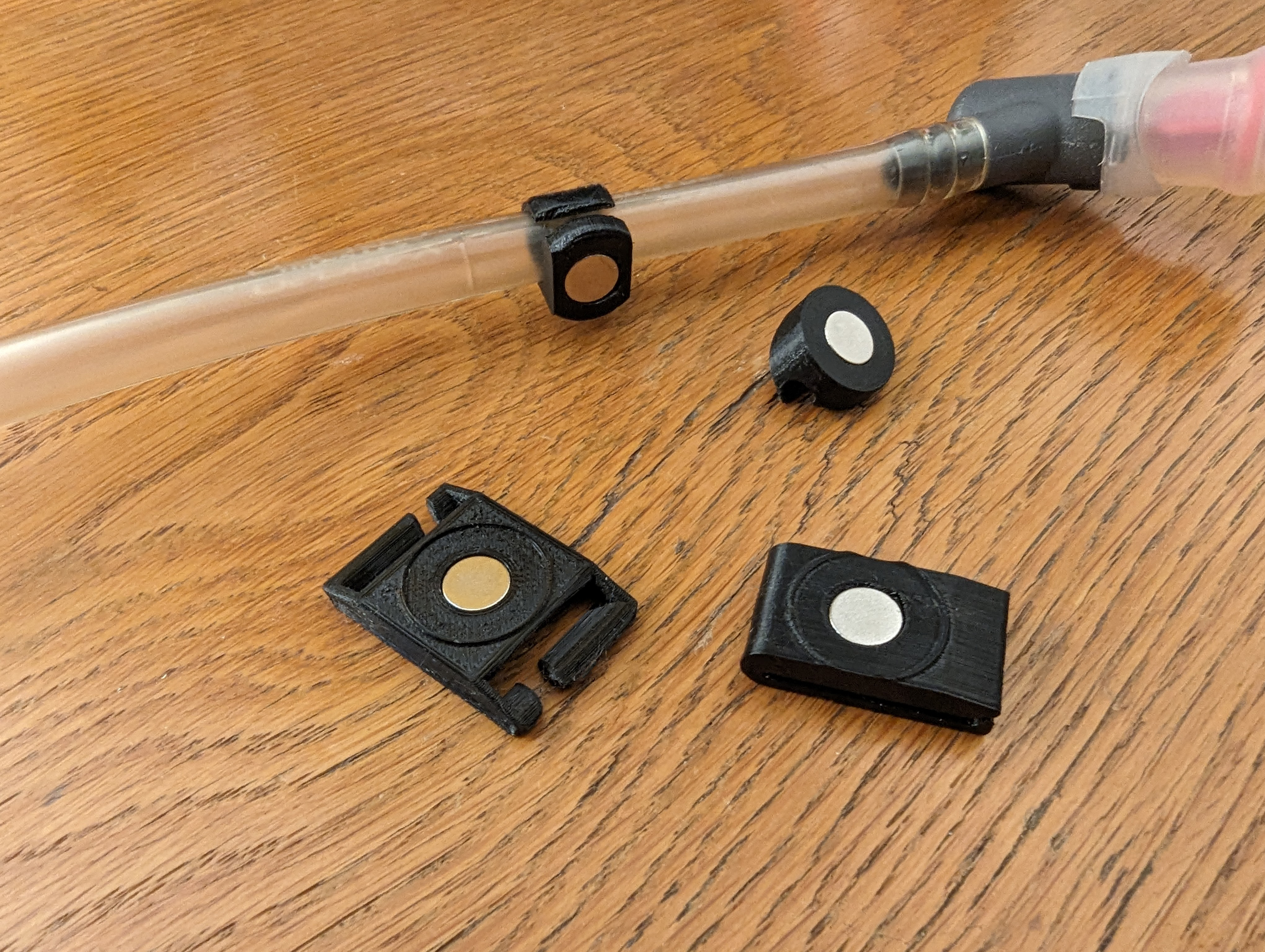 Hydration pack tube magnetic attachment kit