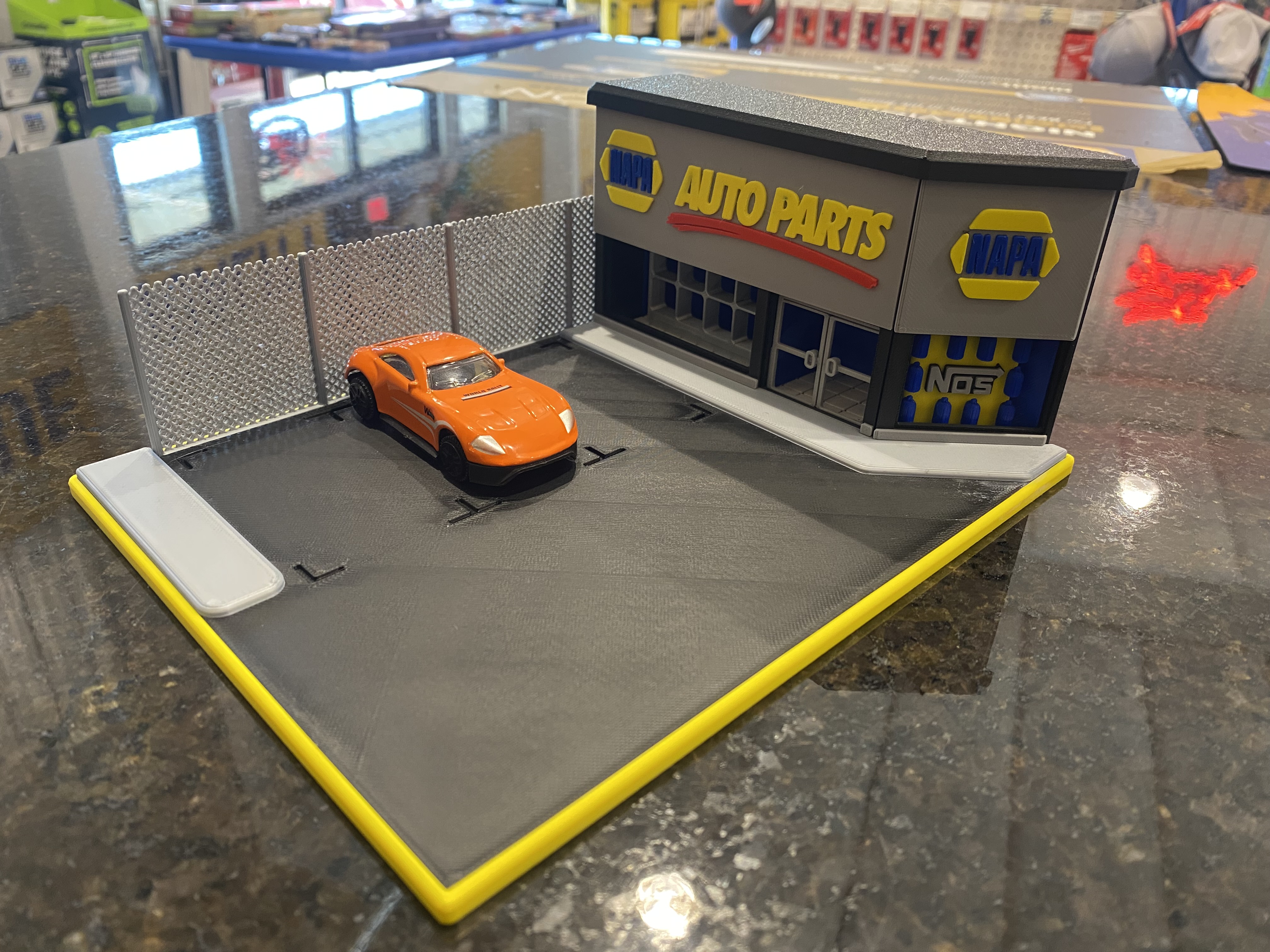"NAPA Auto Parts" front signage for GigaPenguin Tuner Shop