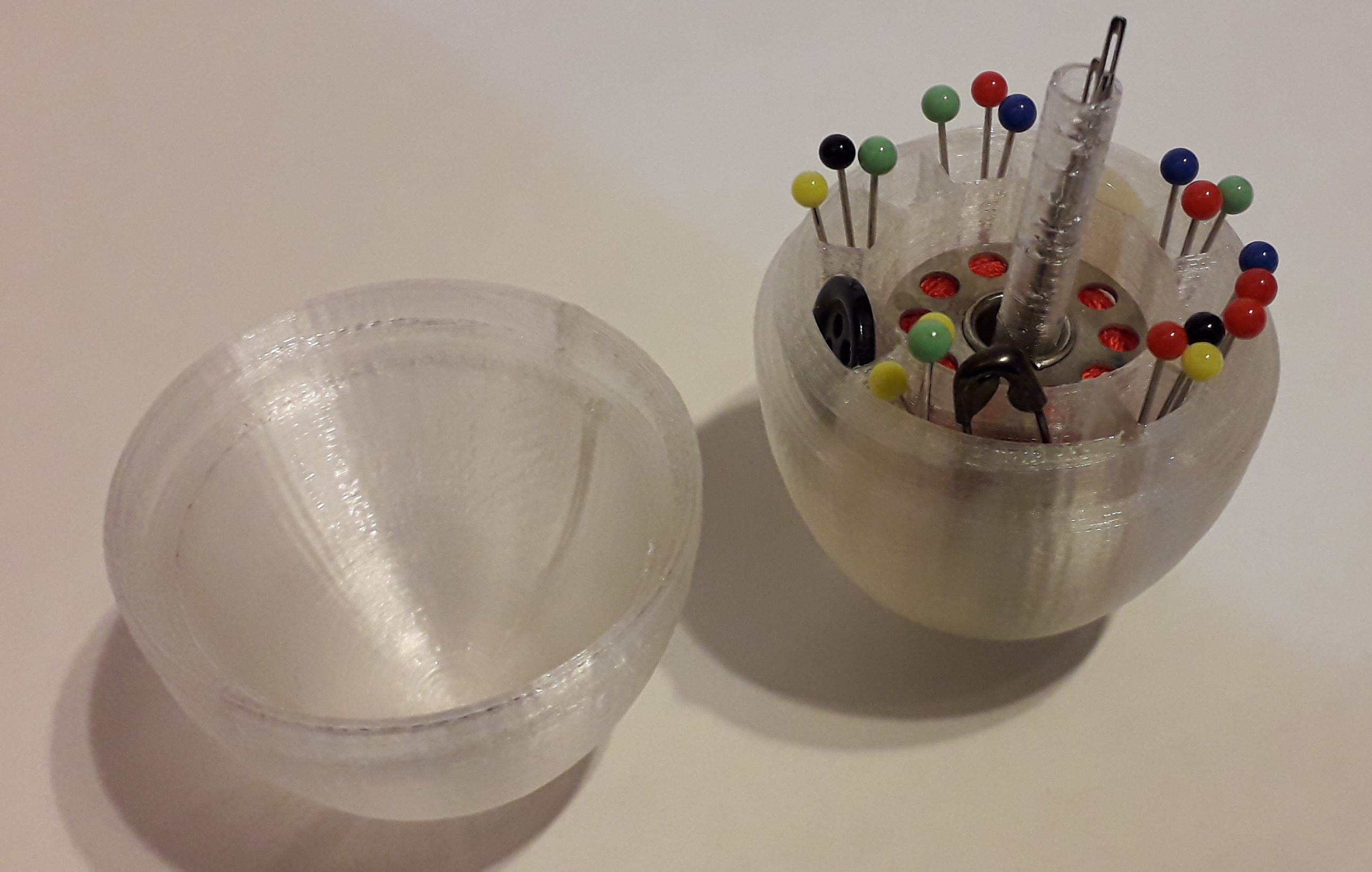 Sewing egg (perfect for socks). Openable container for sewing materials.